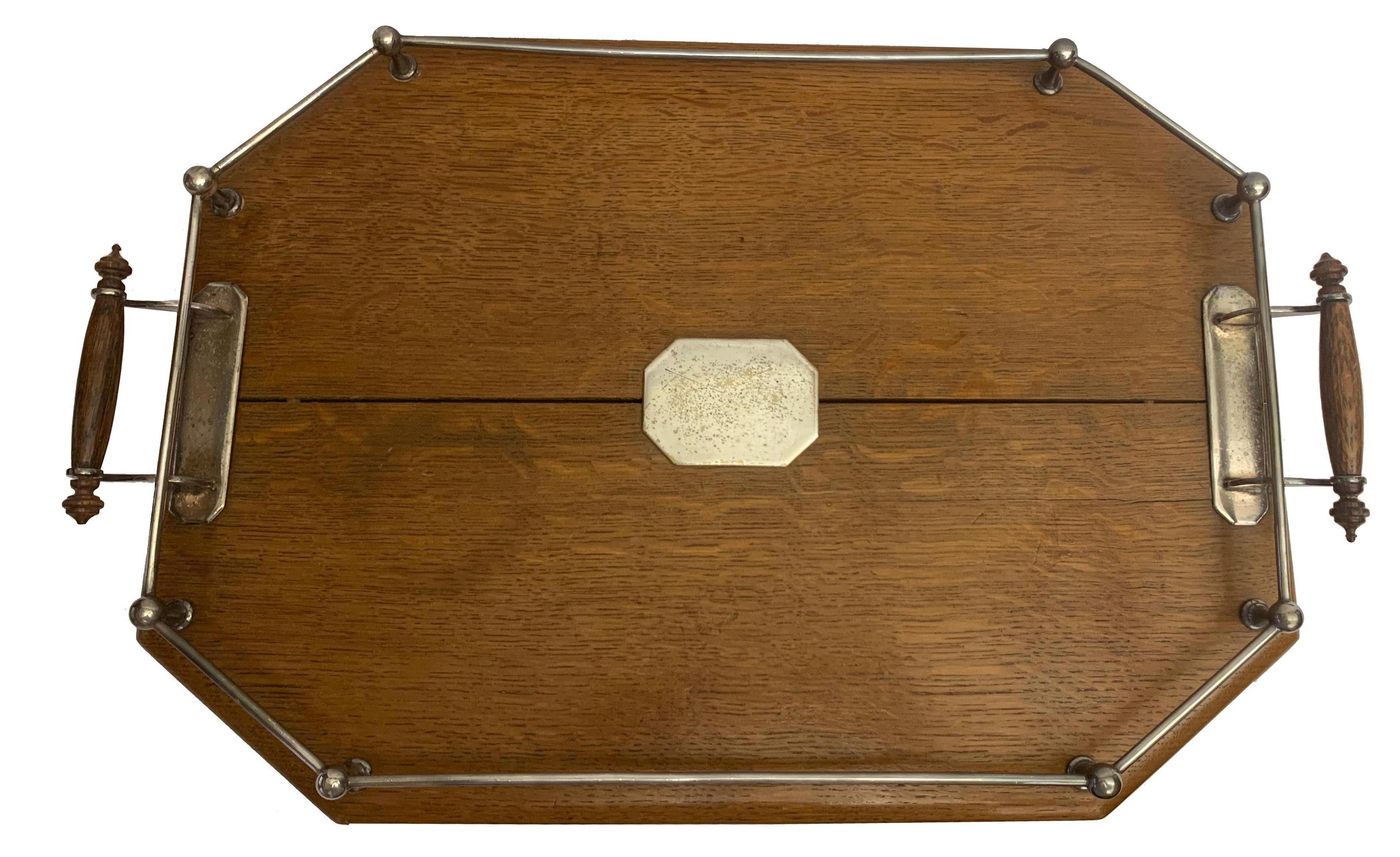 A beautiful 19th century oak and silver tea tray. 

Property from esteemed interior designer Juan Montoya. Juan Montoya is one of the most acclaimed and prolific interior designers in the world today. Juan Montoya was born and spent his early