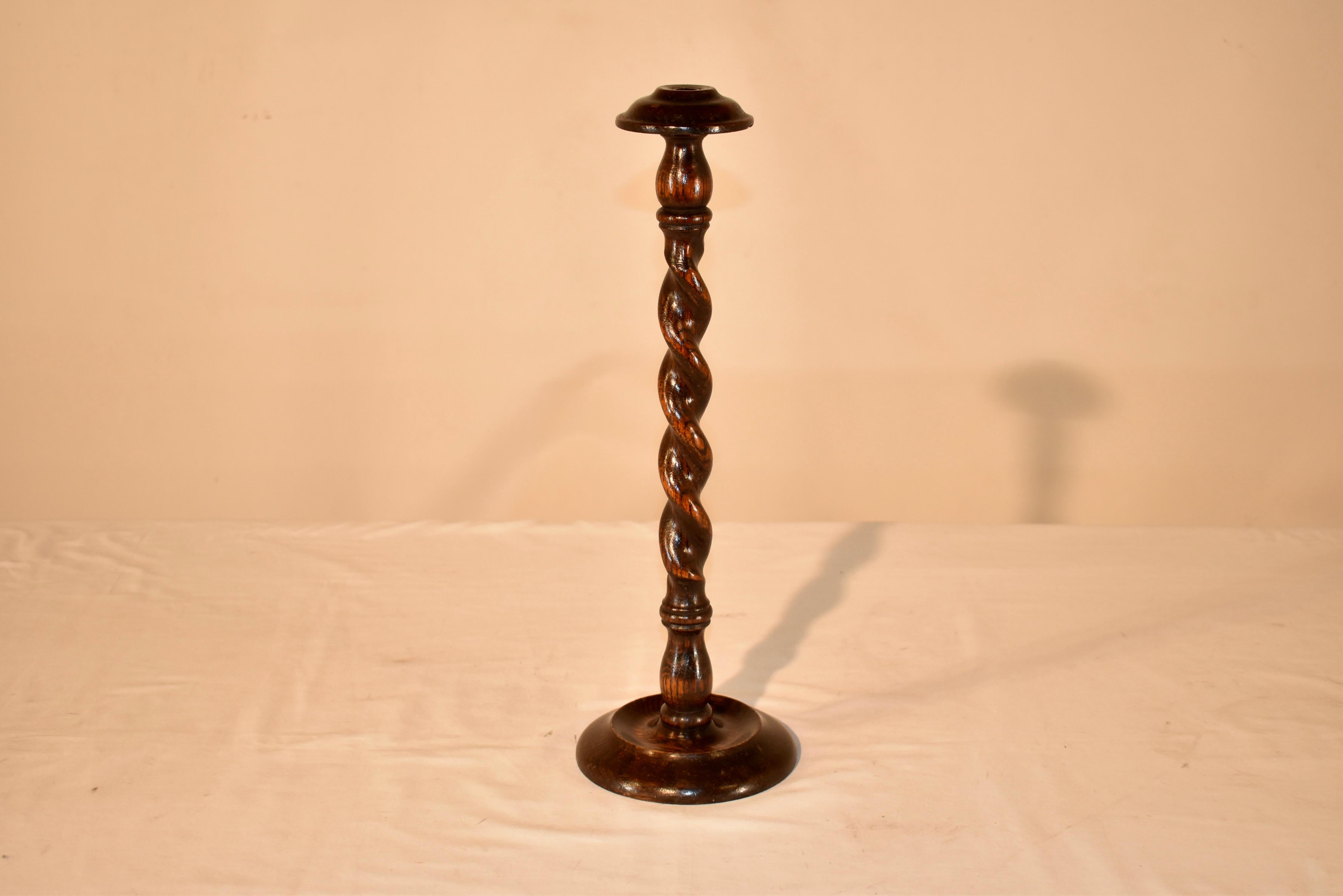 19th century oak hat stand.  The star is made to place a hat  on a dresser or in a dressing room.  The base is dish shaped and is hand turned, along with the stem, which is turned barley twist.  The top on which to place the hat is nicely turned as