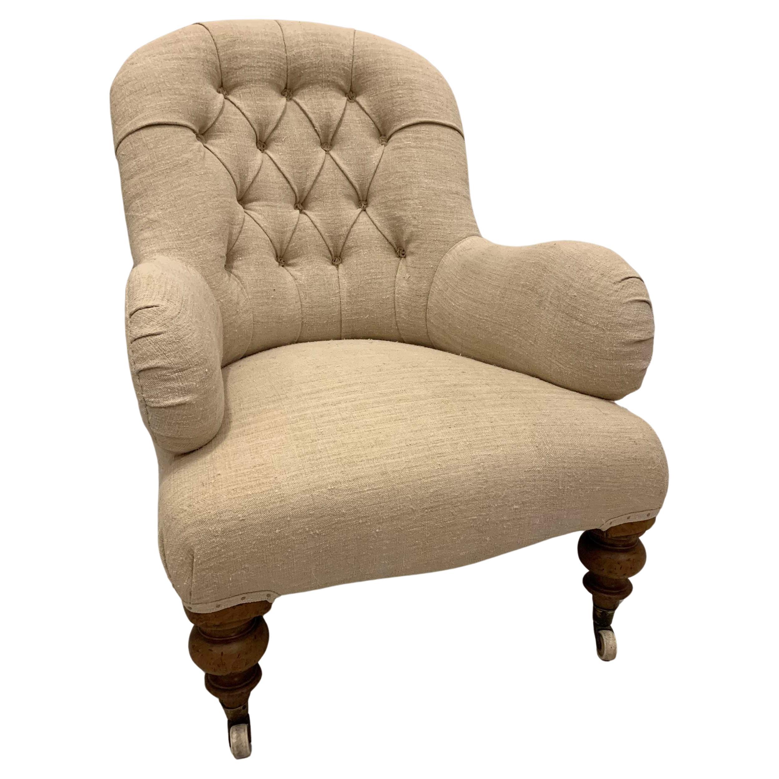 19th century English upholstered buttoned back armchair in french linen