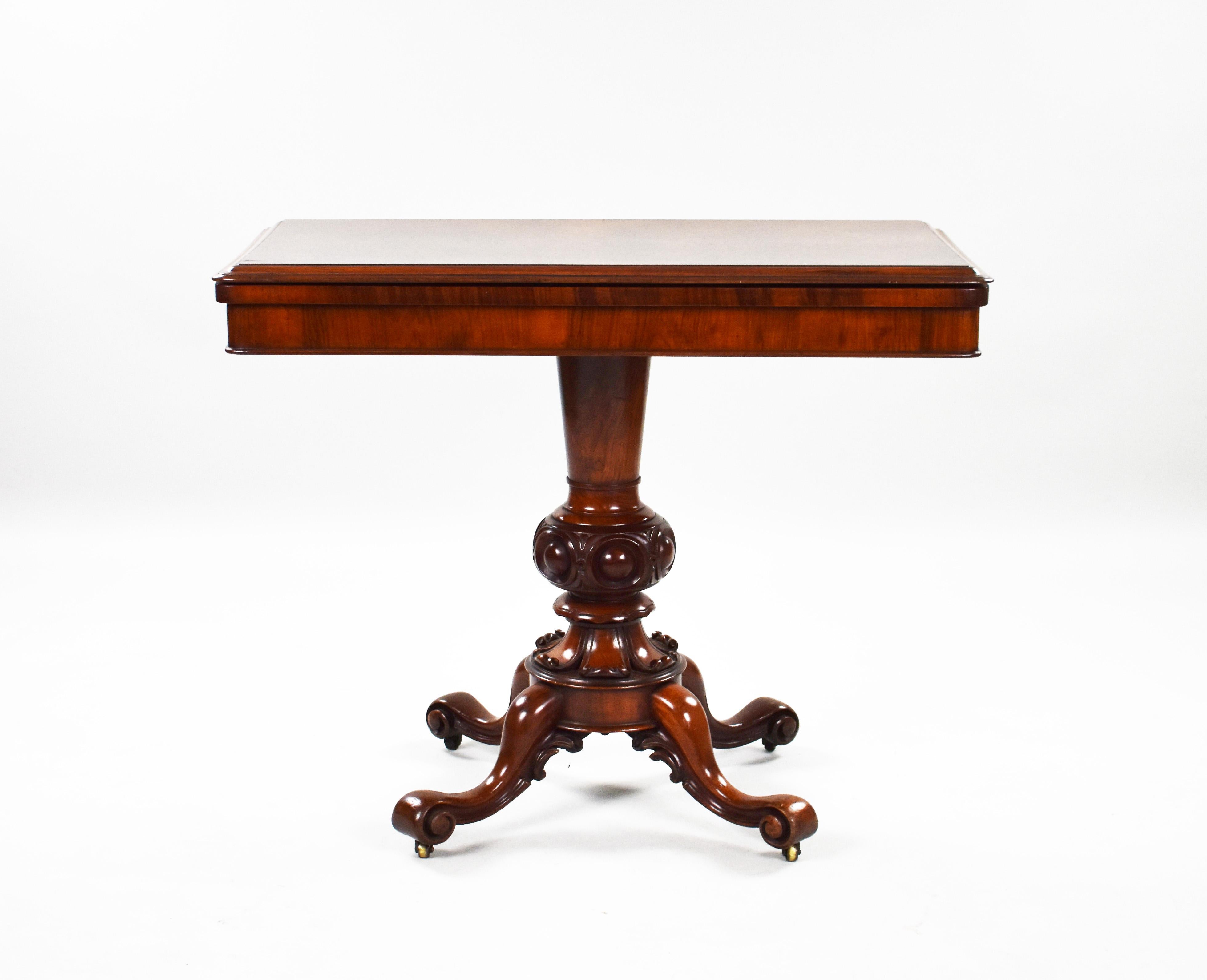 For sale is a good quality Victorian burr walnut fold over card table. Opening to a circular green baise lined interior, above a turned and carved stem standing on ornate legs raised on castors. This piece is in very good condition for its