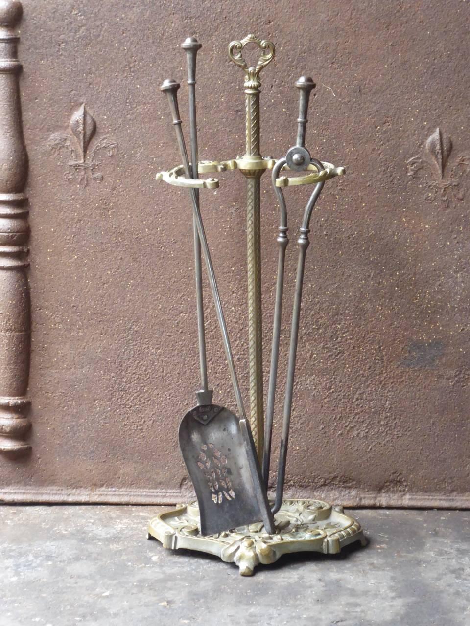 19th century English Victorian fireplace tool set - fire irons made of wrought iron and brass.

We have a unique and specialized collection of antique and used fireplace accessories consisting of more than 1000 listings at 1stdibs. Amongst others,