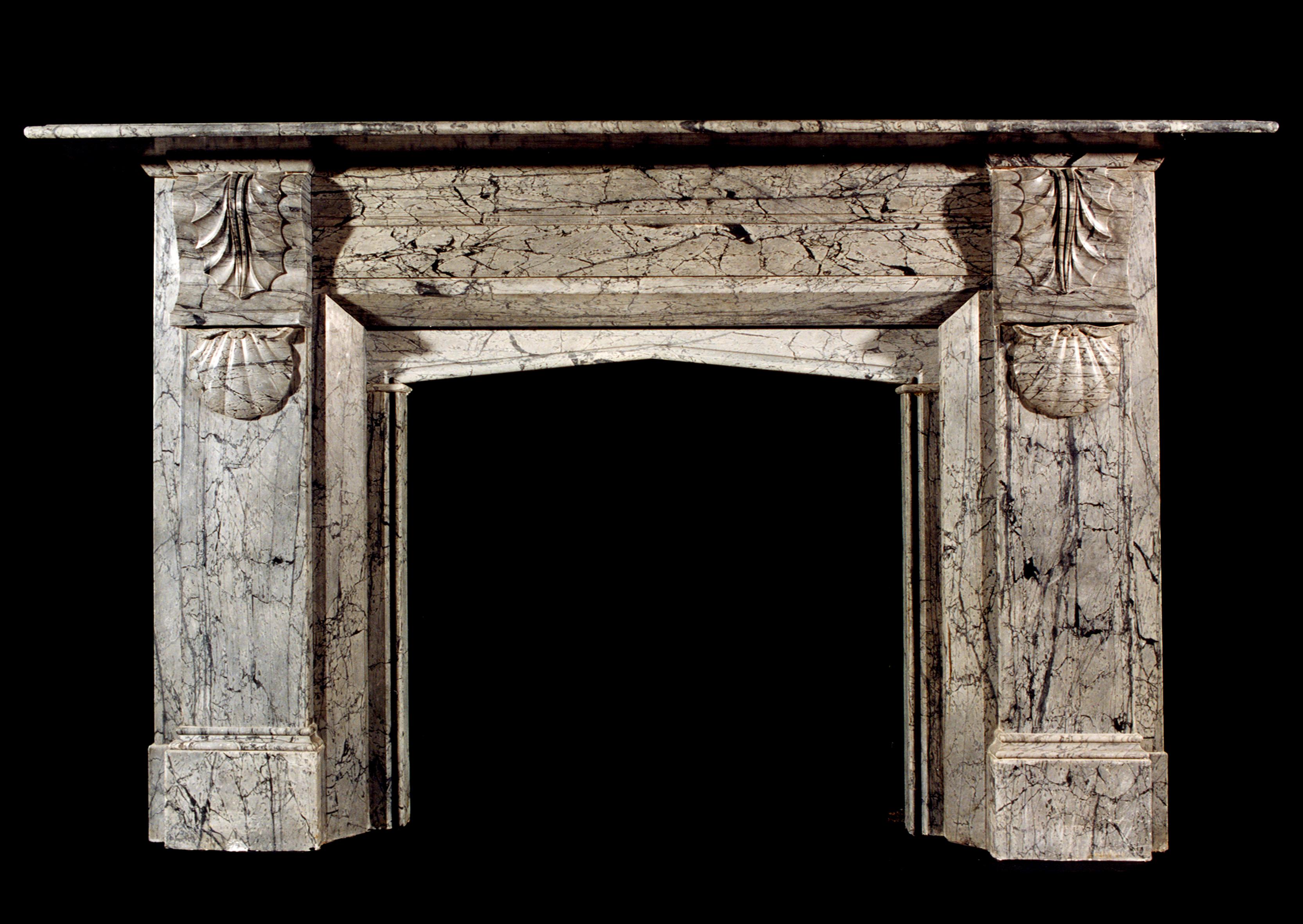 A 19th century English Victorian dove grey marble fireplace, with carved brackets to jambs and arched opening.

Shelf Width:	2265 mm      	89 1/8 in
Overall Height:	1390 mm      	54 3/4 in
Opening Height:	970 mm      	38 1/4 in
Opening Width:	1015