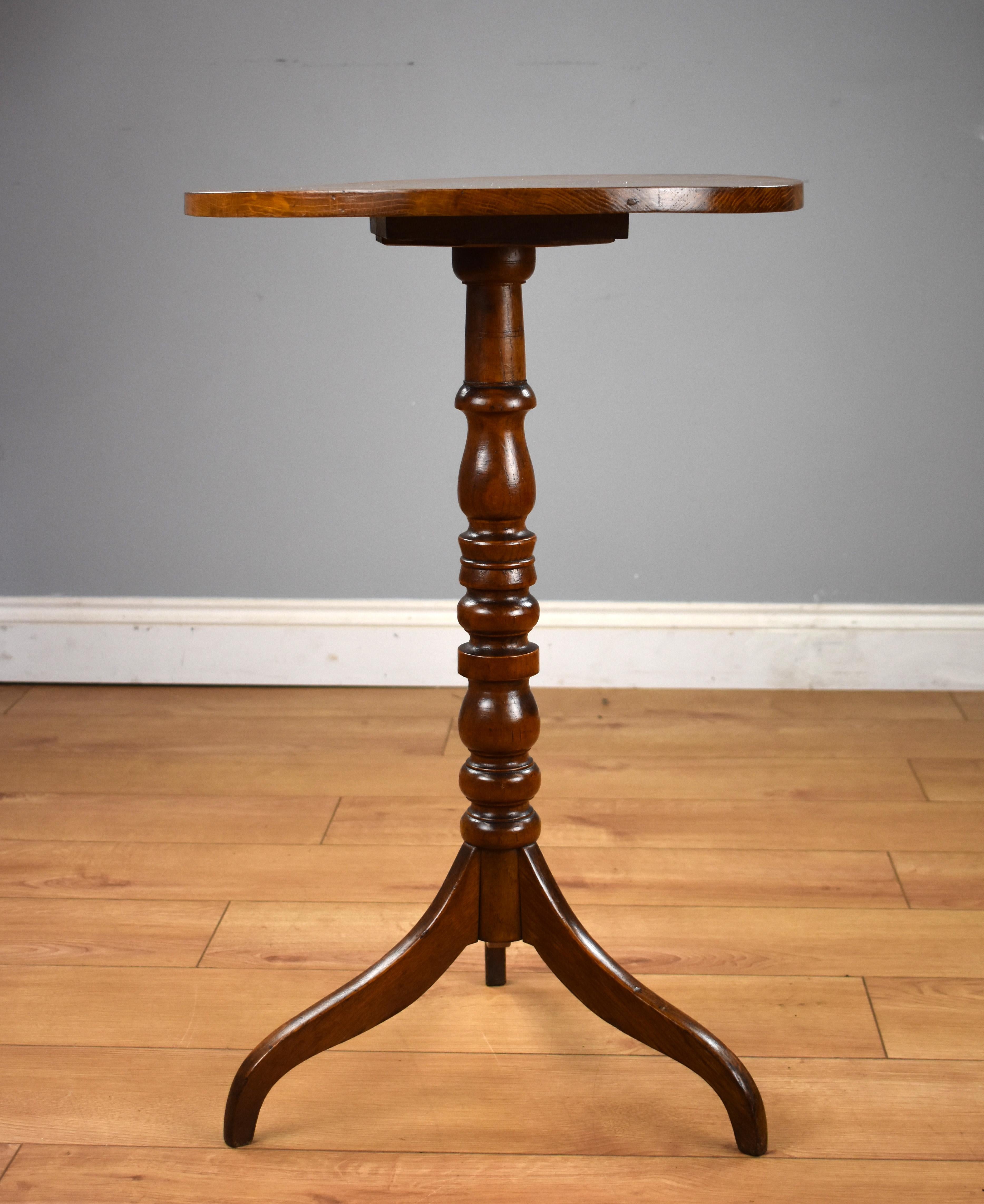 For sale is good quality unusual early Victorian elm occasional table, having a circular top above a well turned base, standing on three elegant legs. The table is in very good, original condition for its age. 

Measures: Width 18