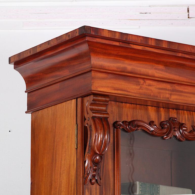 19th Century English Victorian Figured Mahogany Bookcase with Carved Details 1