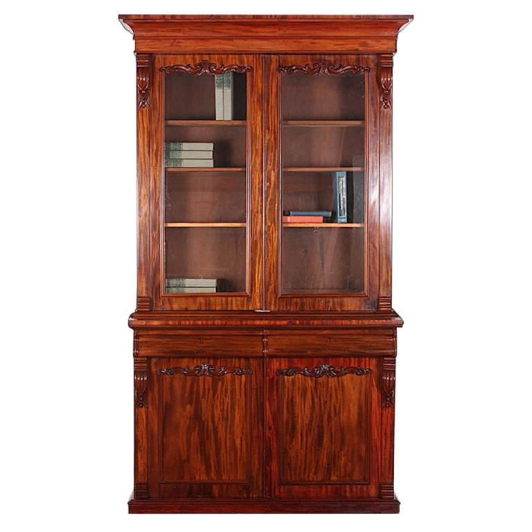 19th Century English Victorian Figured Mahogany Bookcase with Carved Details