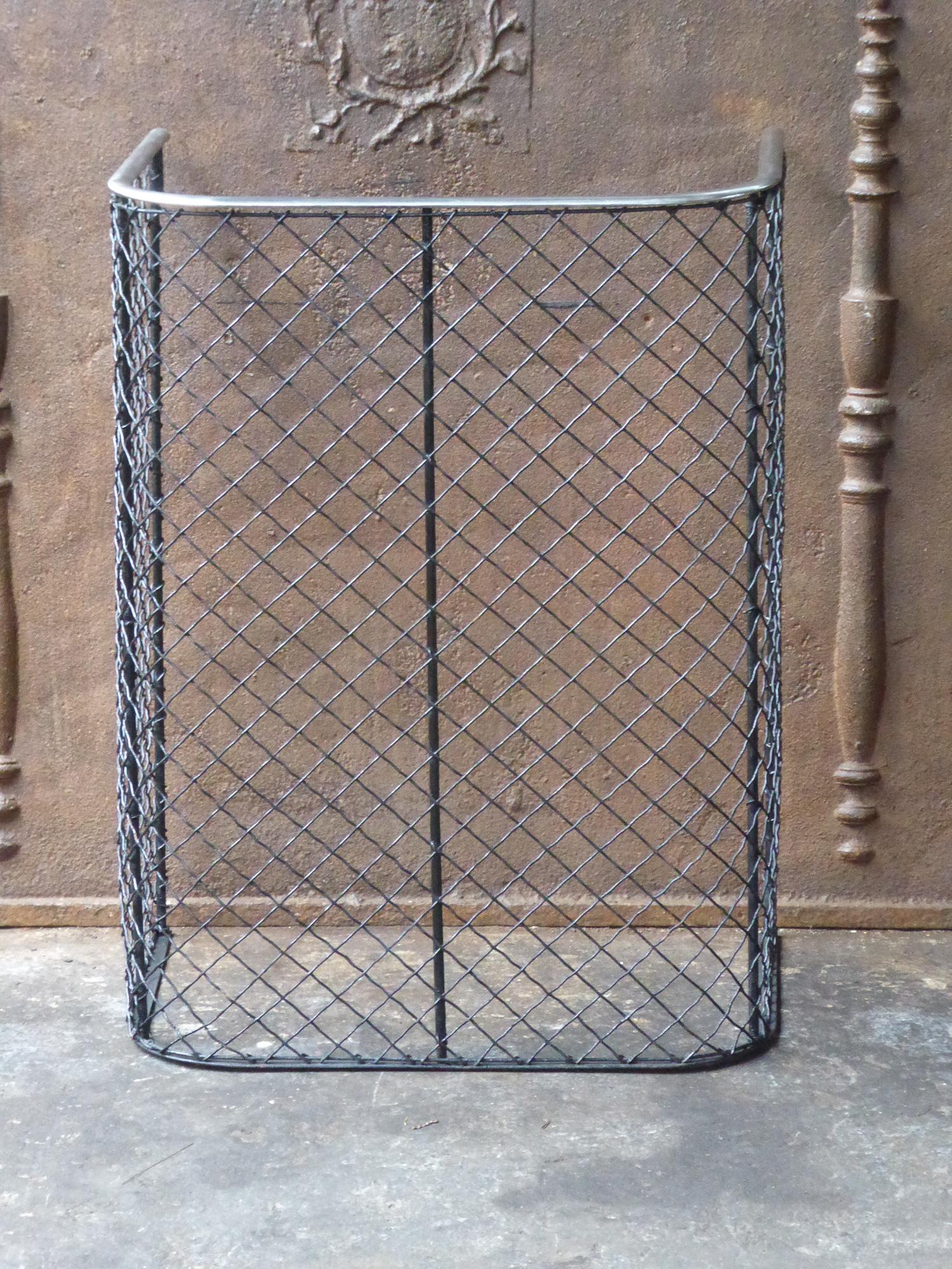19th century English Victorian fireguard - fireplace guard made of polished steel, iron and iron mesh.







 