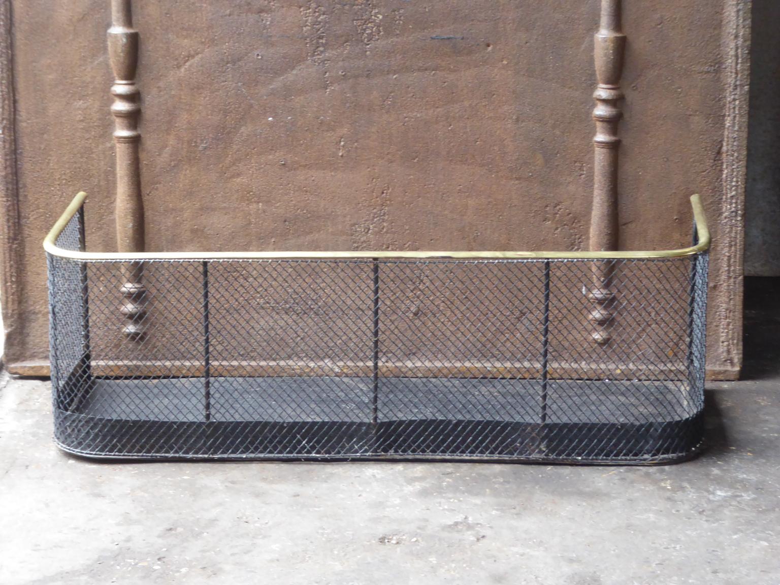 19th century English Victorian fireguard - fireplace guard made of brass, iron and iron mesh. The fire guard is in a good condition and is fully functional.







   