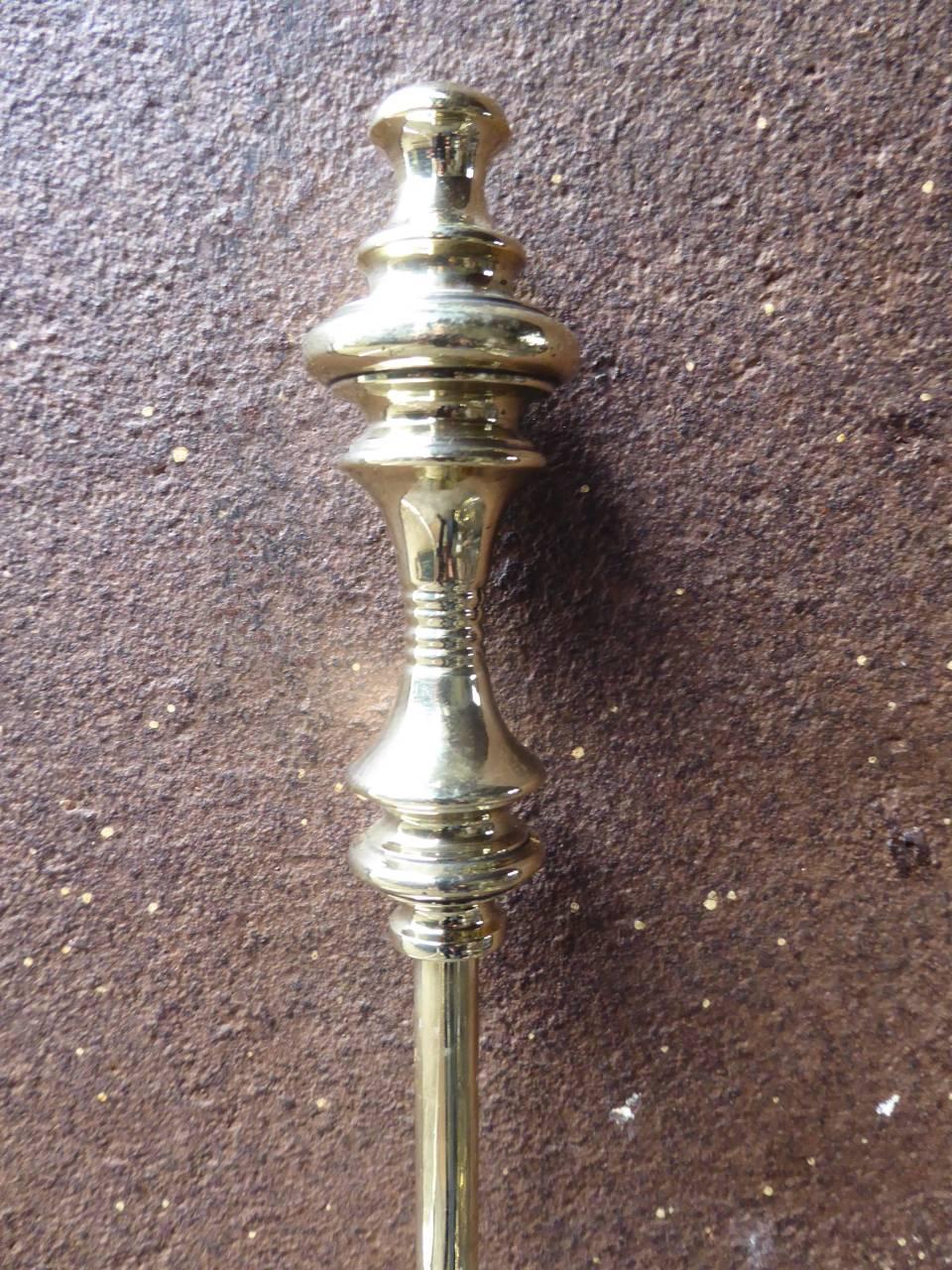 19th century English Victorian fireplace poker made of polished brass.

We have a unique and specialized collection of antique and used fireplace accessories consisting of more than 1000 listings at 1stdibs. Amongst others we always have 300+