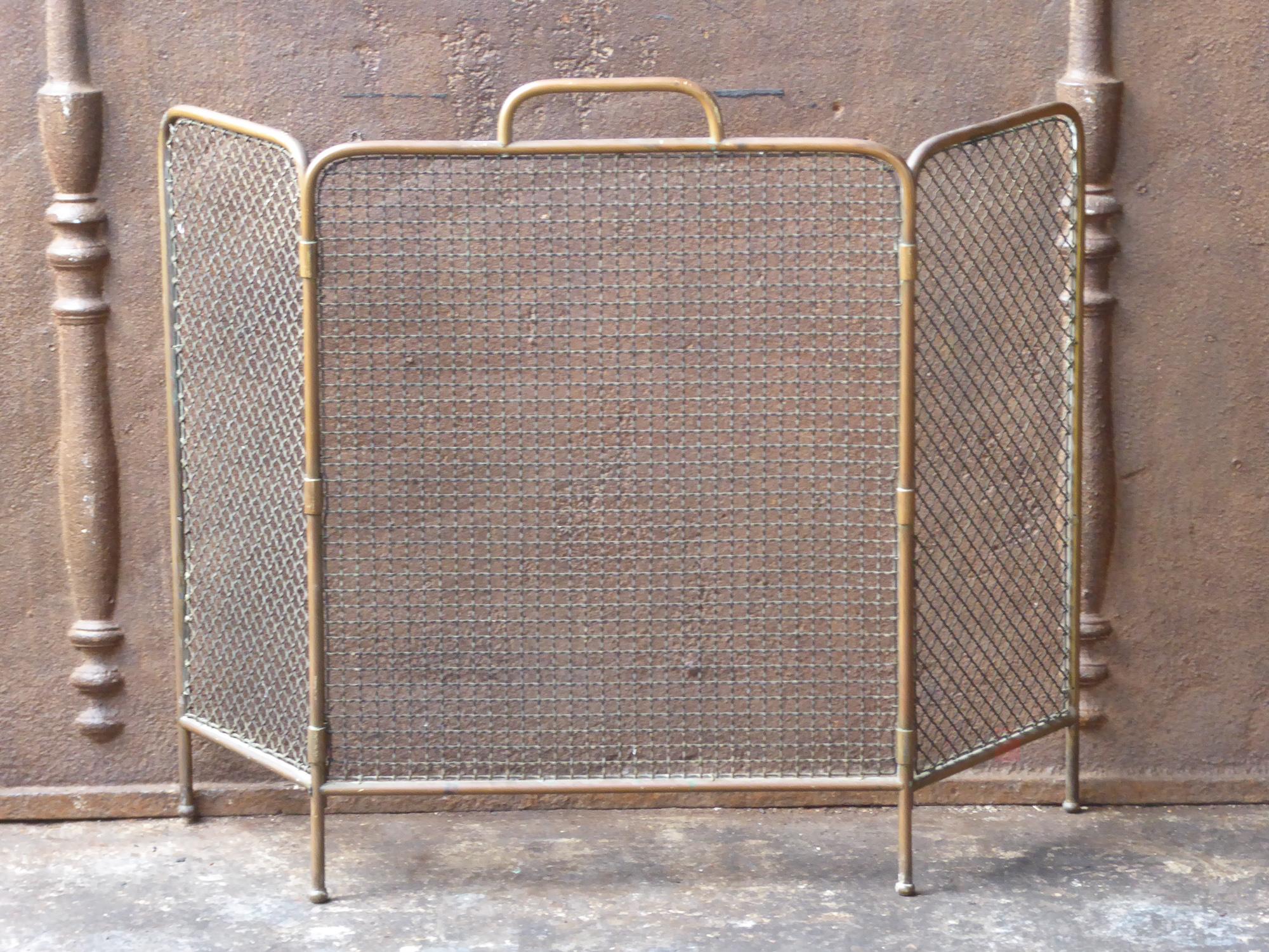 19th century English Victorian fireplace screen made of brass.







