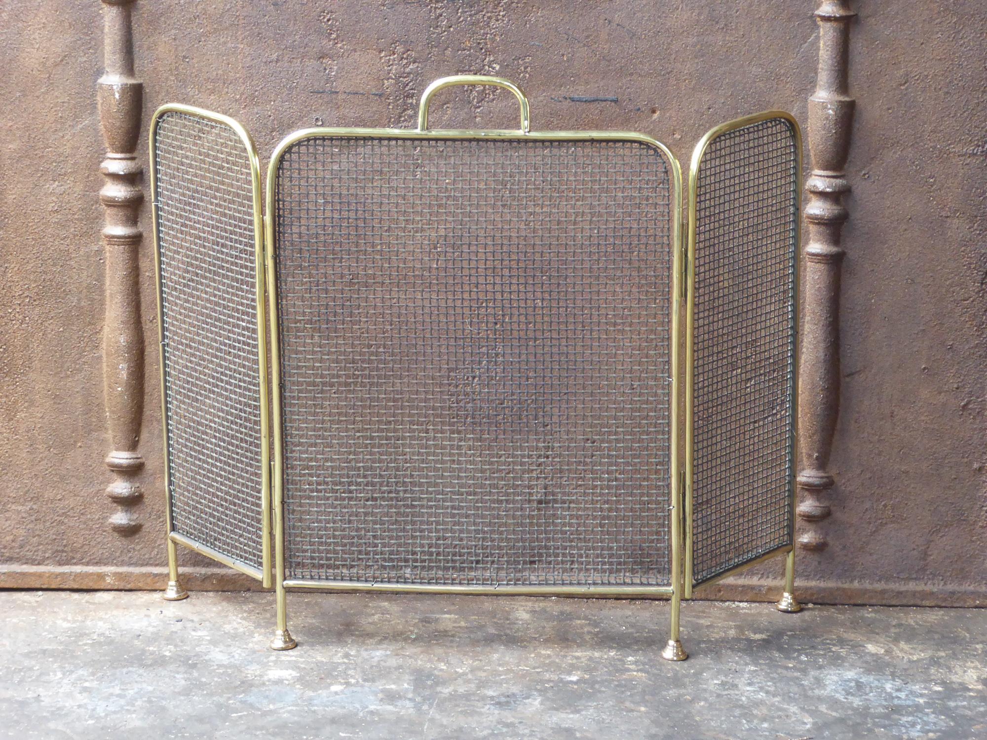 19th century English Victorian fireplace screen made of polished brass and iron mesh.

We have a unique and specialized collection of antique and used fireplace accessories consisting of more than 1000 listings at 1stdibs. Amongst others, we