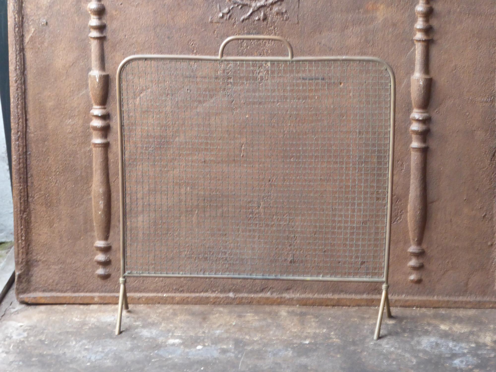 19th century English Victorian fireplace screen made of brass.







 