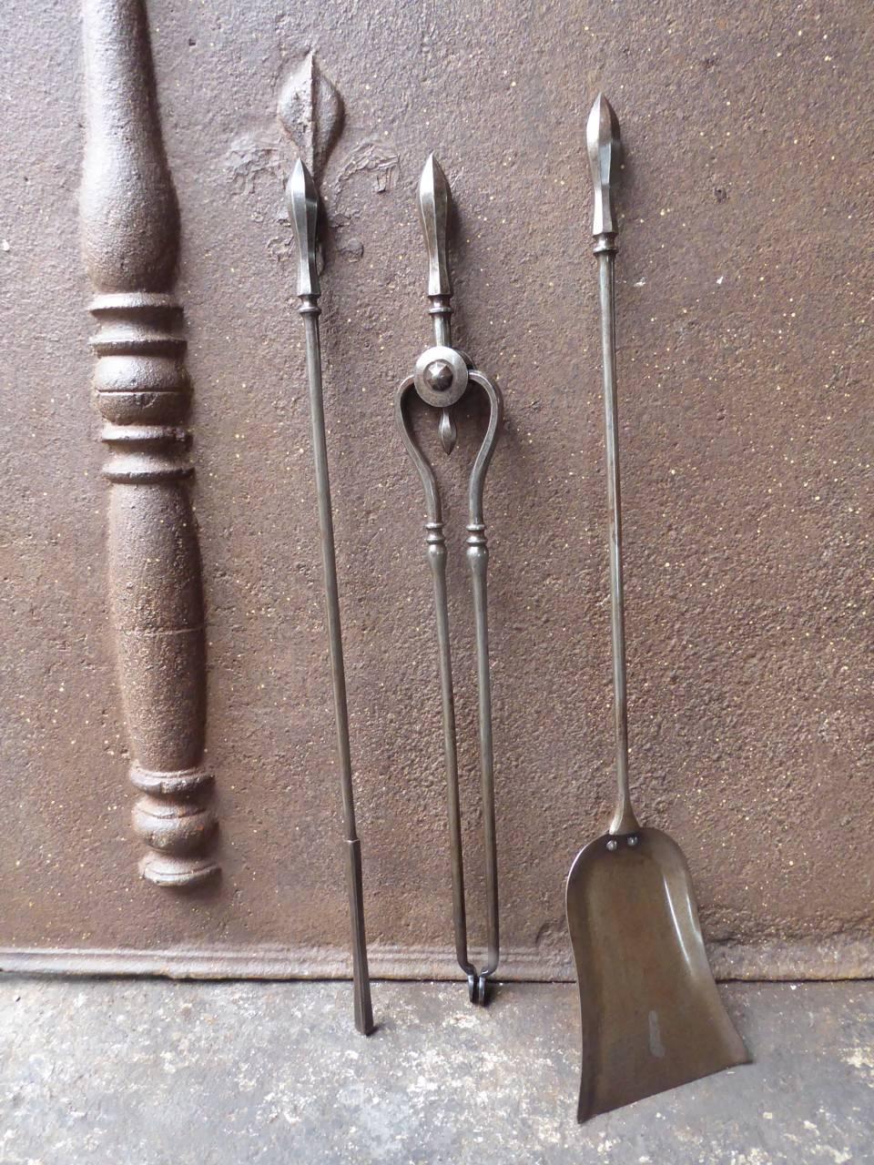 19th century English Victorian fireplace tool set - fire irons made of wrought iron.

We have a unique and specialized collection of antique and used fireplace accessories consisting of more than 1000 listings at 1stdibs. Amongst others, we always