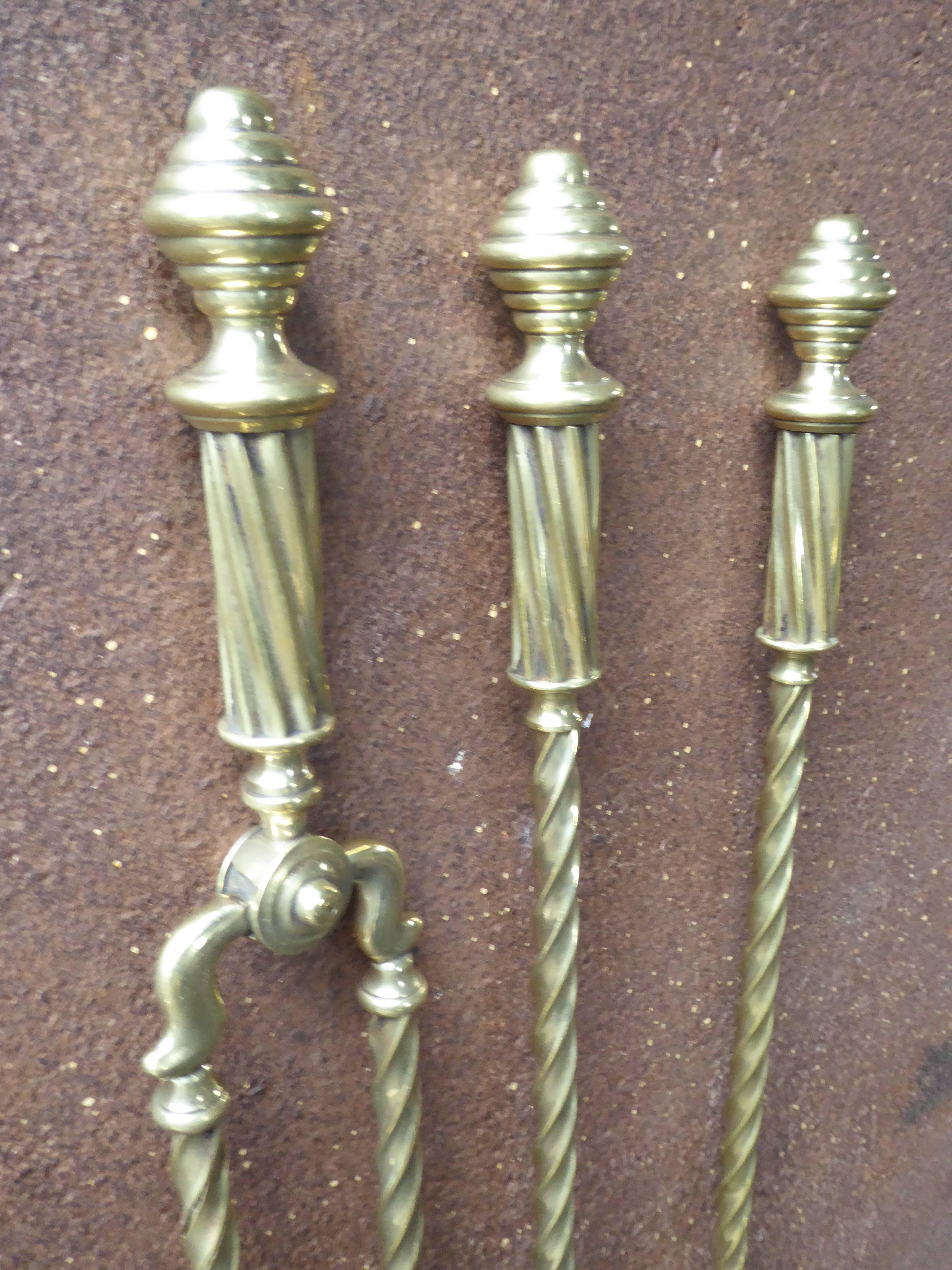 19th century English Victorian fireplace tool set - fire irons made of brass.

We have a unique and specialized collection of antique and used fireplace accessories consisting of more than 1000 listings at 1stdibs. Amongst others, we always have