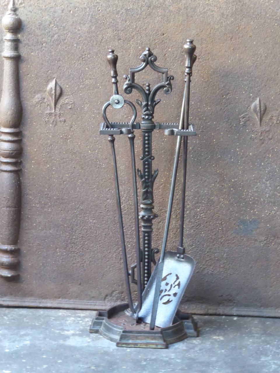 19th century English Victorian fireplace tool set - fire irons made of cast iron and wrought iron.

We have a unique and specialized collection of antique and used fireplace accessories consisting of more than 1000 listings at 1stdibs. Amongst