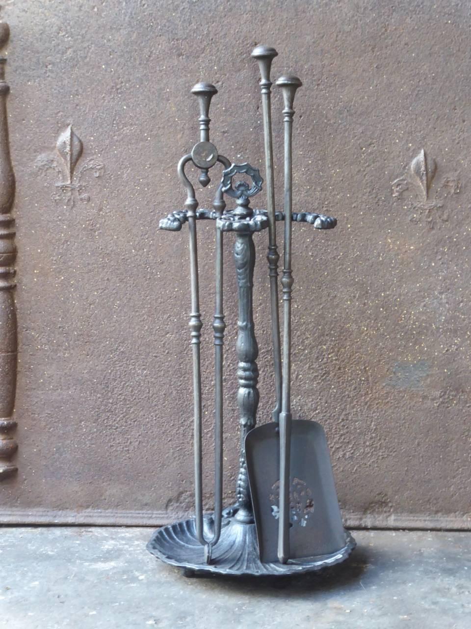 19th century English Victorian fireplace tool set, fire irons made of cast iron and wrought iron.

We have a unique and specialized collection of antique and used fireplace accessories consisting of more than 1000 listings at 1stdibs. Amongst others