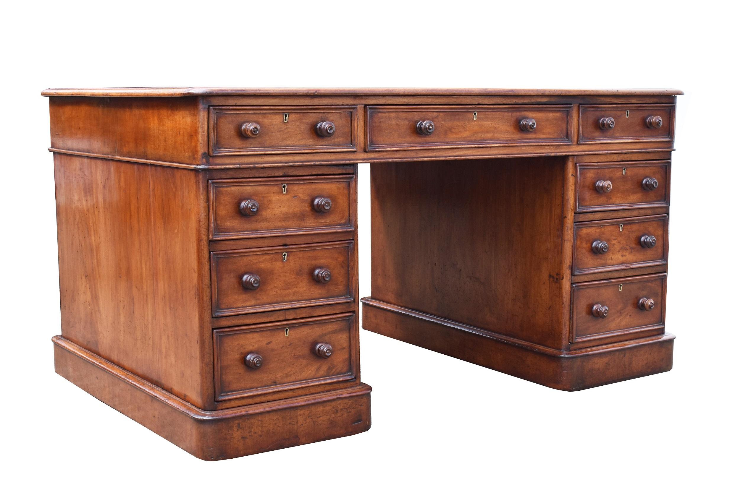 For sale is a good quality Victorian mahogany partners desk, the top being inset with a red leather, decorated with gold tooling. Below this the top has a total of six drawers, three to the front and a further three on the opposing side. The top