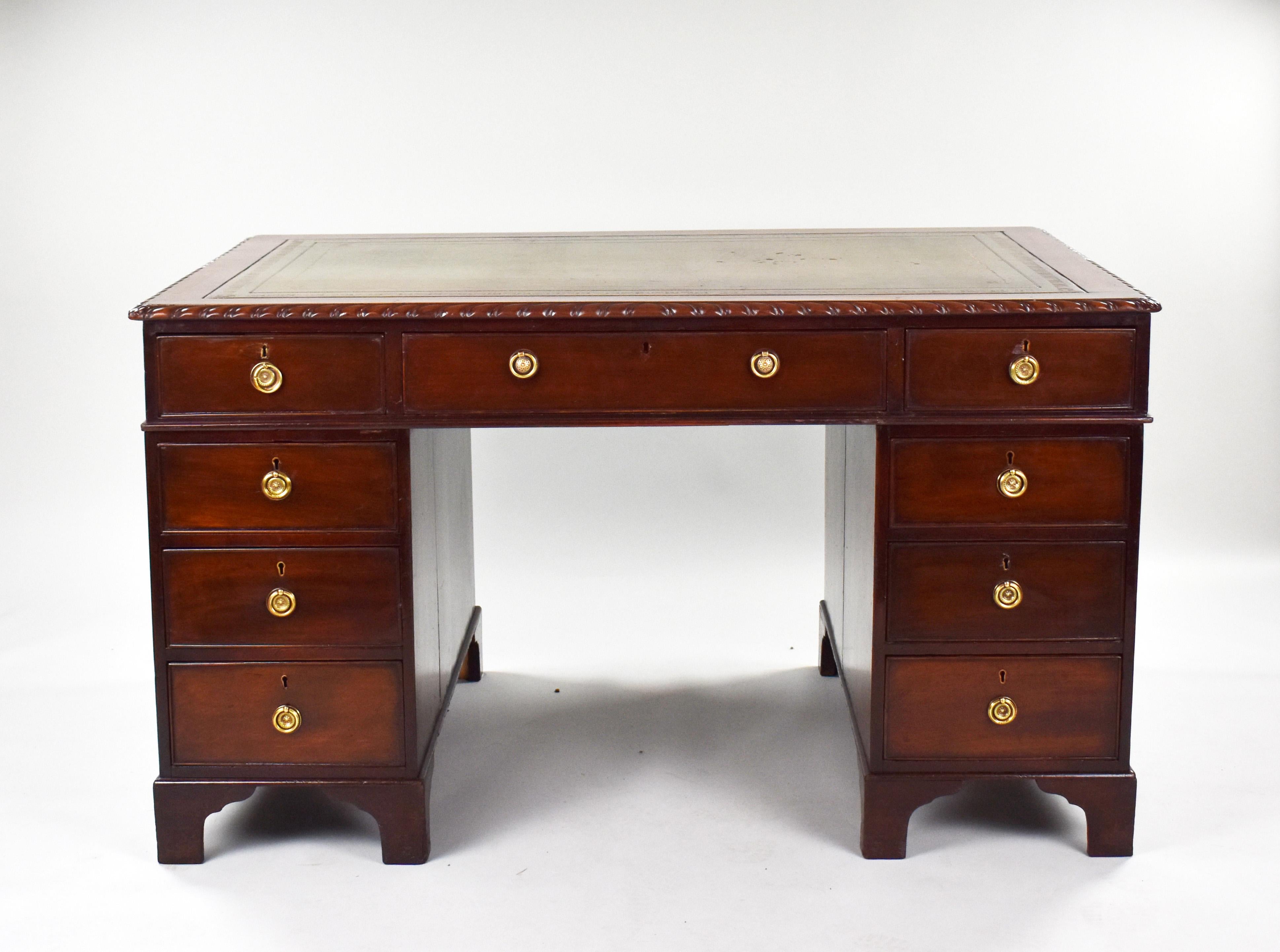 For sale is a Victorian mahogany partners desk. The top having green leather hide writing surface, decorated with blind and gold tooling. The top has three drawers to the front, and two long drawers on the opposing side. Fitting onto two pedestals,