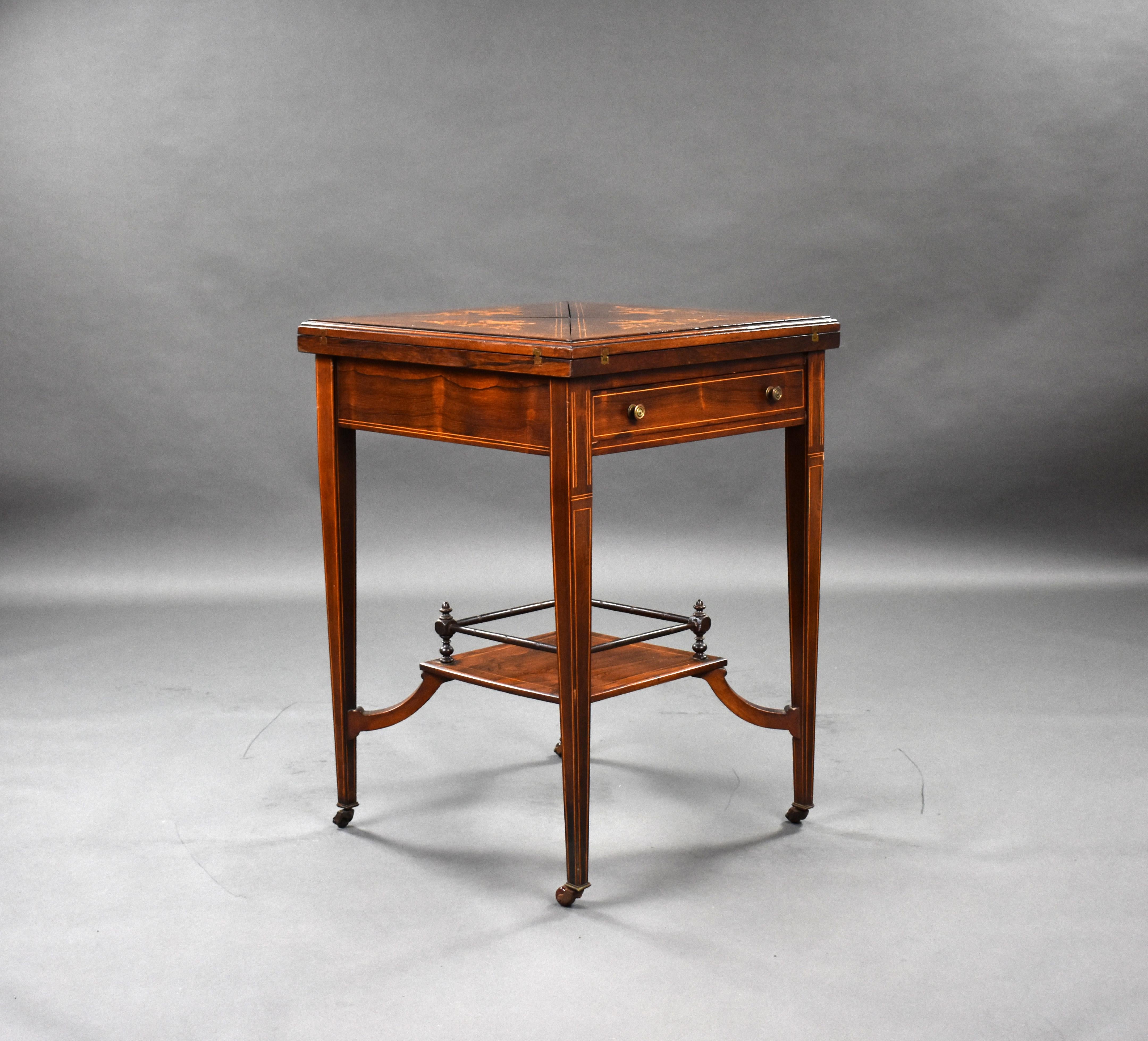 For sale is a good quality Victorian rosewood inlaid envelope card table, remaining in very good condition for its age. 

Measures: Width: 53cm Depth: 53cm Height: 73cm.