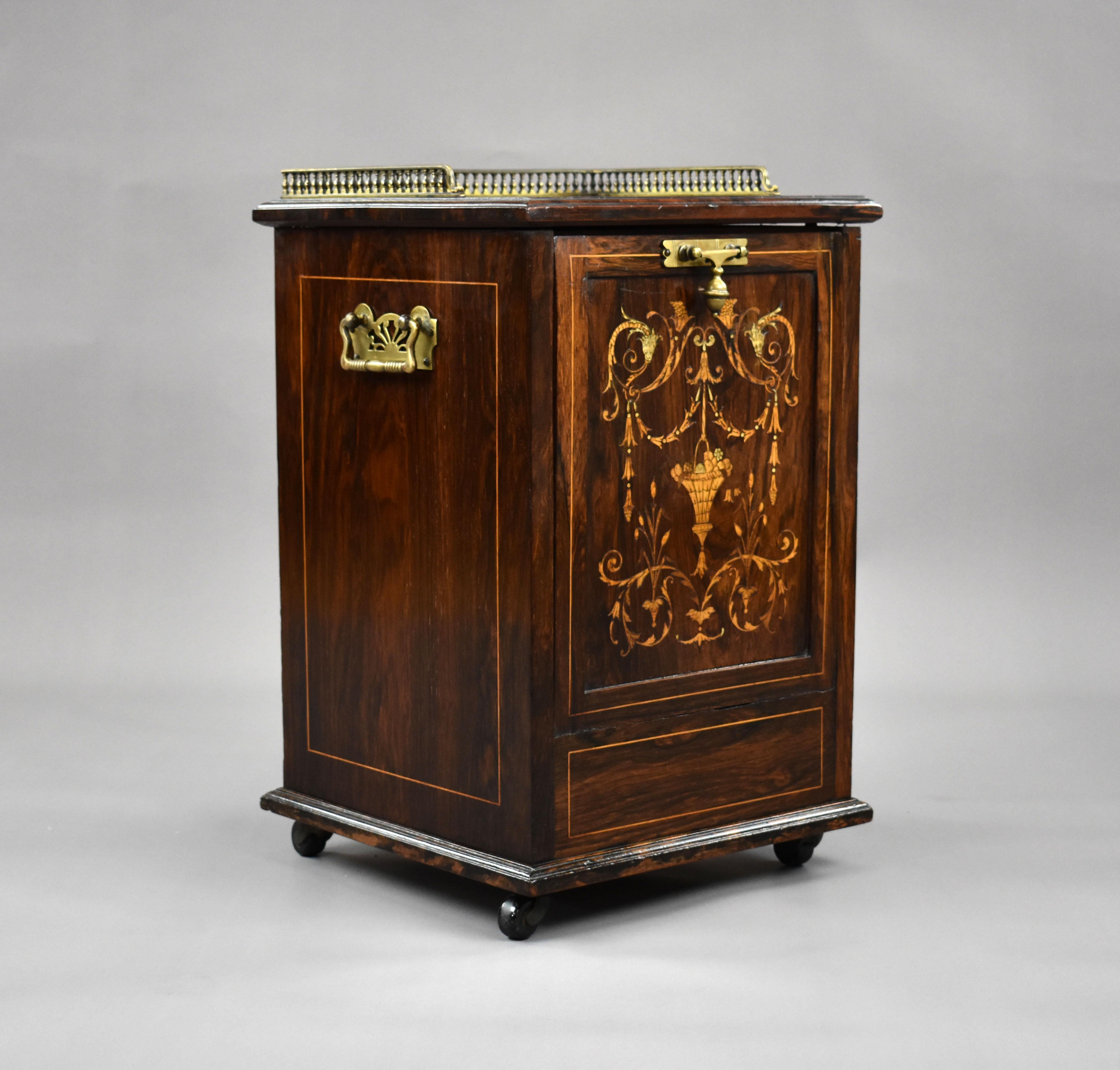 For sale is a good quality Victorian rosewood and marquetry inlaid coal purdonium by Jas Shoolbred, remaining in very good condition for its age.