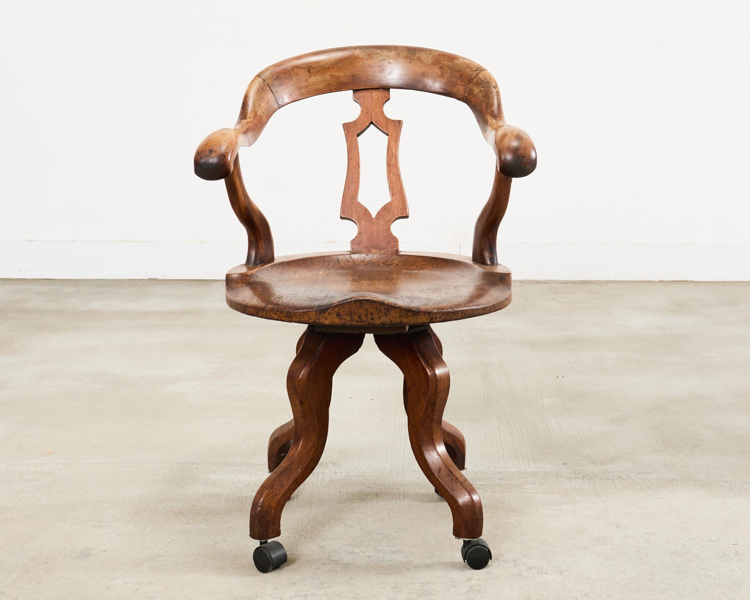 Vittoriano 19th Century English Victorian Swivel Captains Desk Chair in vendita