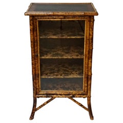 19th Century English Victorian Tiger Bamboo Lacquer Cabinet with Gilt Wallpaper