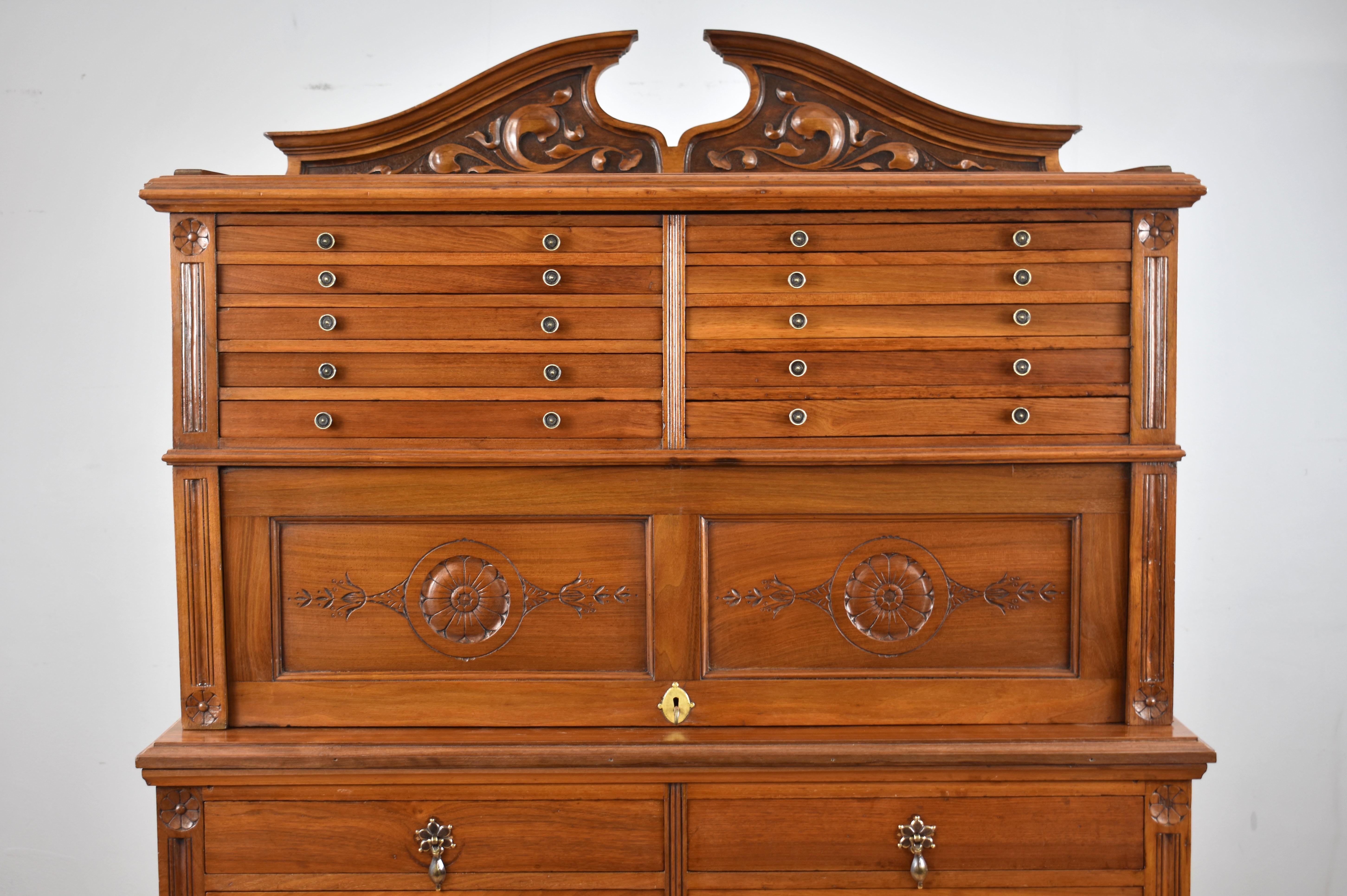 For sale is a Victorian walnut dental cabinet, the super structure fitted with drawers and an open aperture, the base with an arrangement of five graduated drawers above cupboards. The cabinet remains in very good condition, showing minor signs of