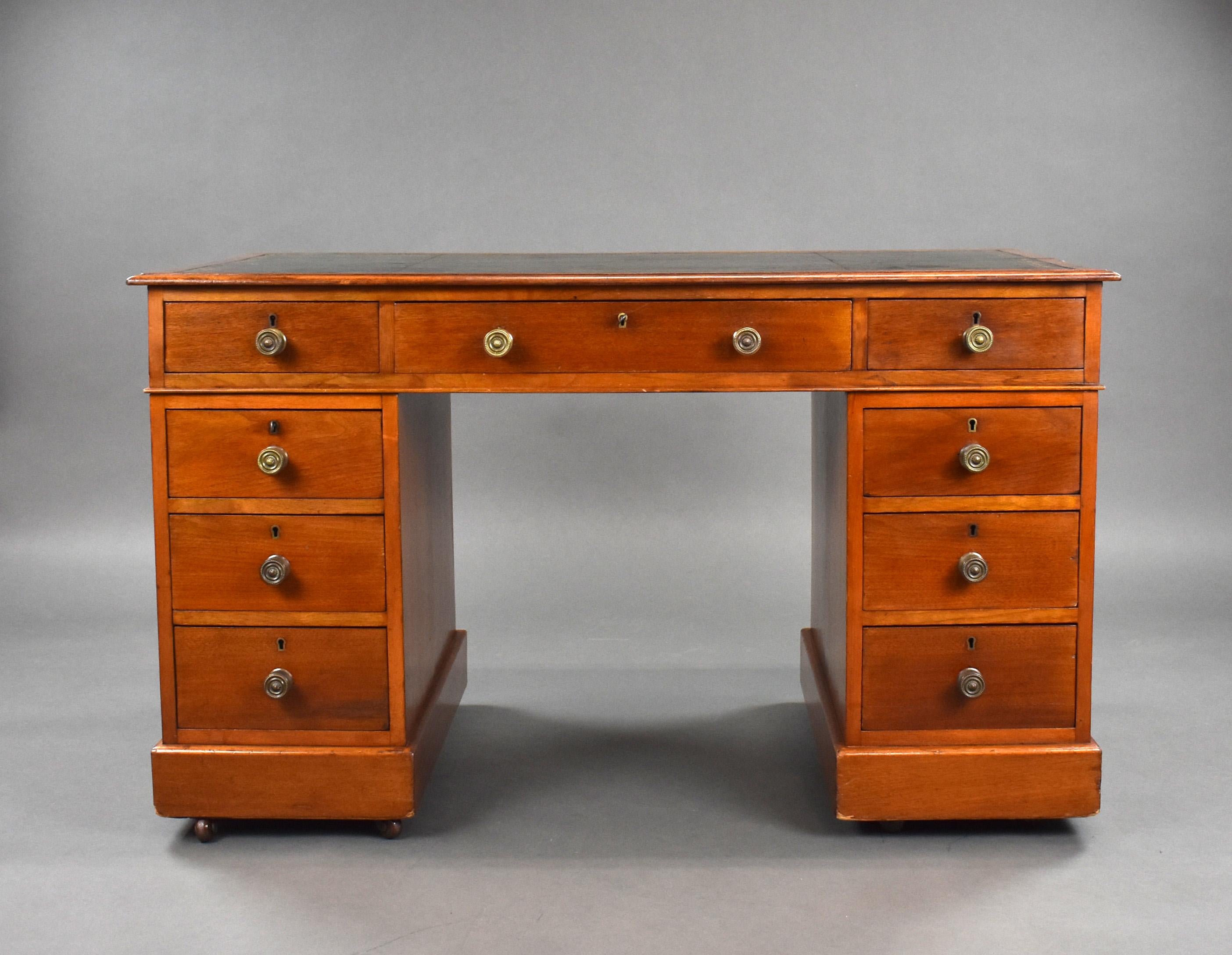 For sale is a good quality Victorian walnut pedestal desk, retaining its original leather skiver writing surface, above three drawers each with brass handles. The top fits onto two pedestals each with a further three drawers above a plinth base