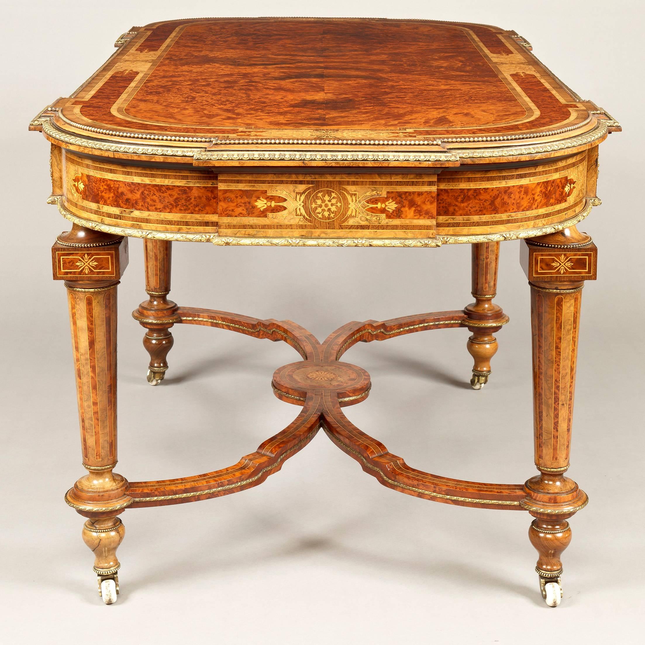 A very fine and substantial centre table in the Louis XVI in the Manner of Holland & Sons

Of exceptional quality, utilising beautifully grained woods, including Circassian walnut, thuya, purple heart and boxwood in the construction, and adorned