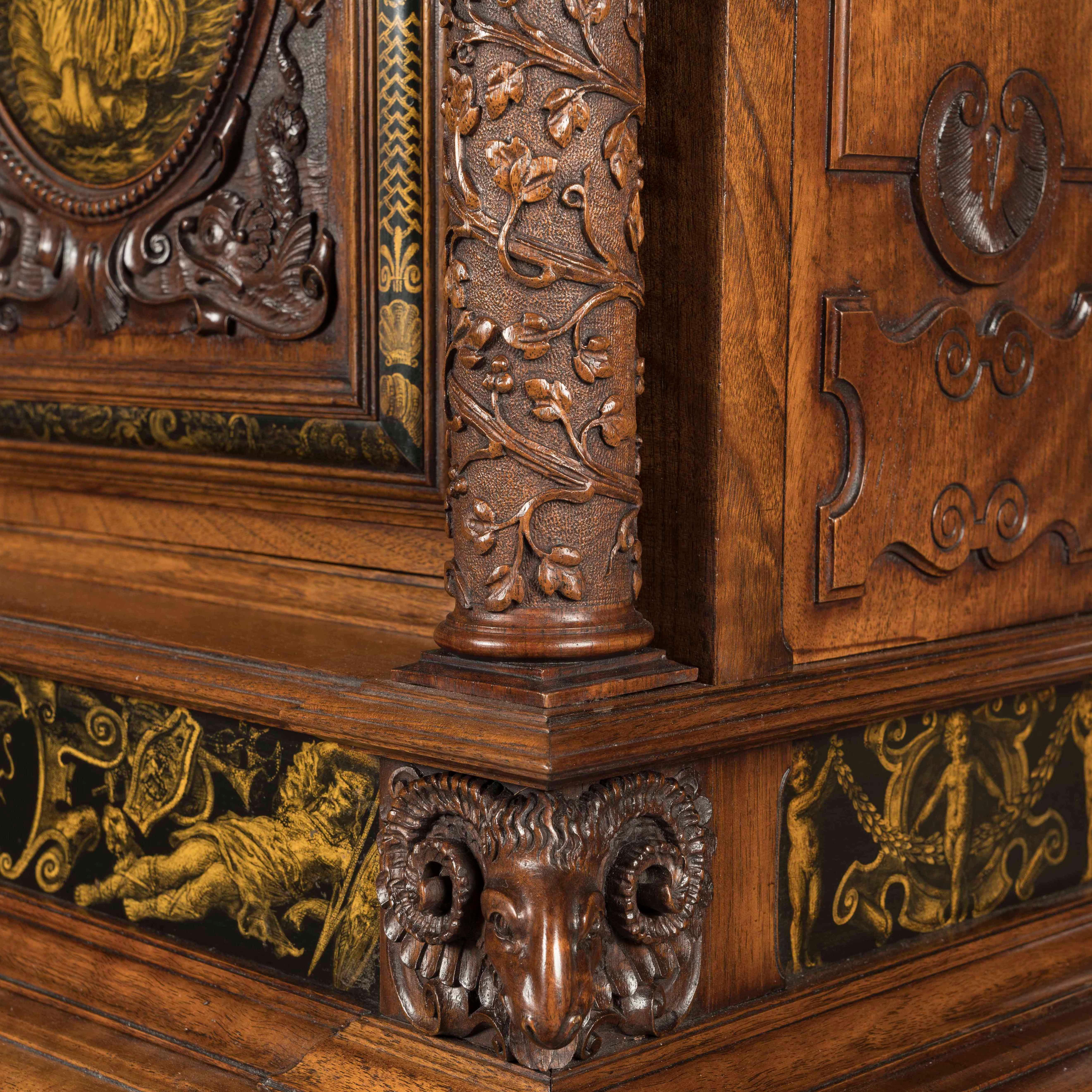 A Gillows Cabinet in the Renaissance Manner

Constructed in walnut, part ebonised, and dressed with convex en grisaille painted plaques; rising from oblate bun feet, having a shaped lower shelf, with an elliptical painted plaque depicting a Roman