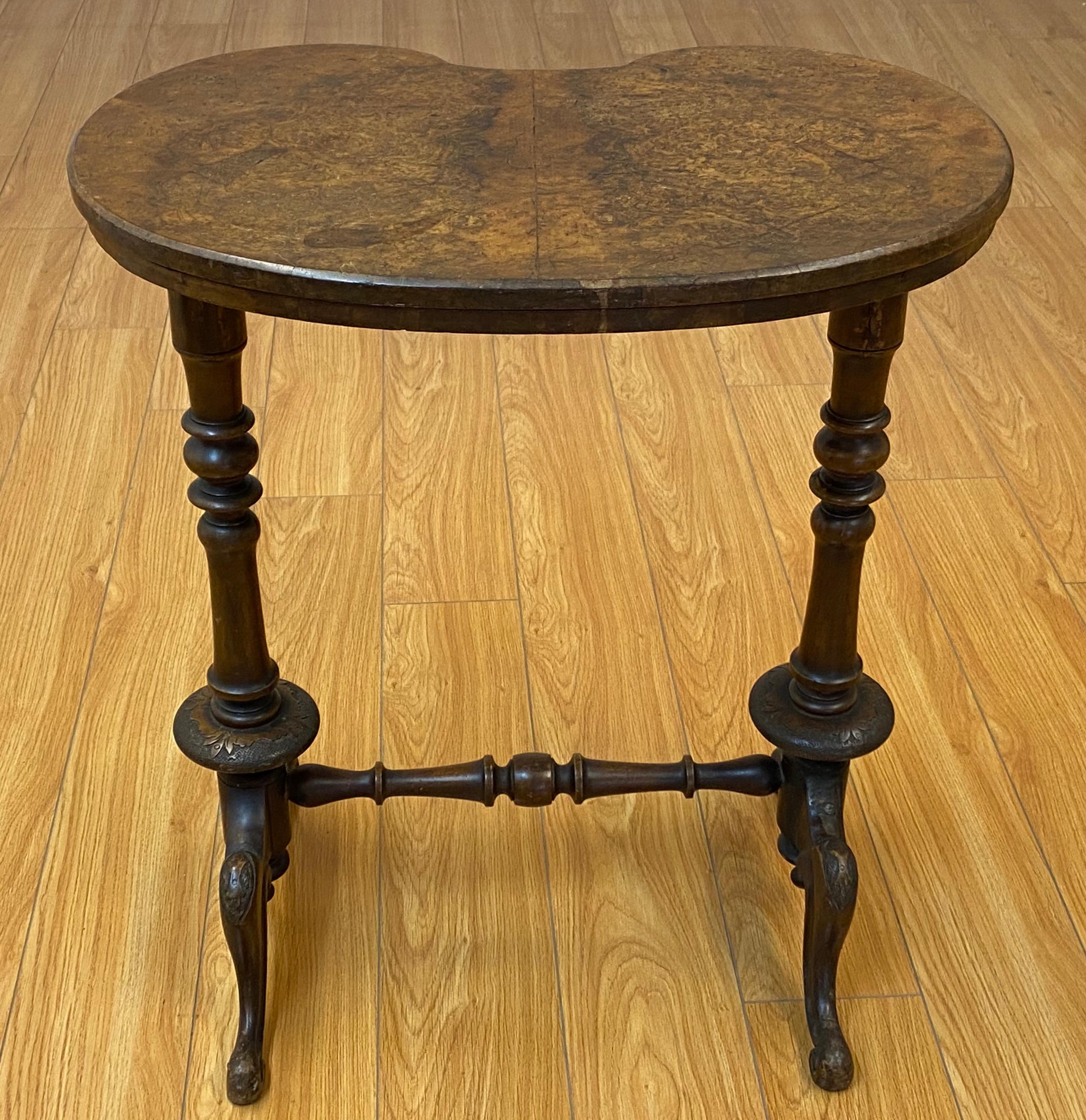19th century English walnut kidney shaped side table c.1880

Hand carved - Pokerwork carving - Custom made

The table shows some past repairs to the base (please see images)

23