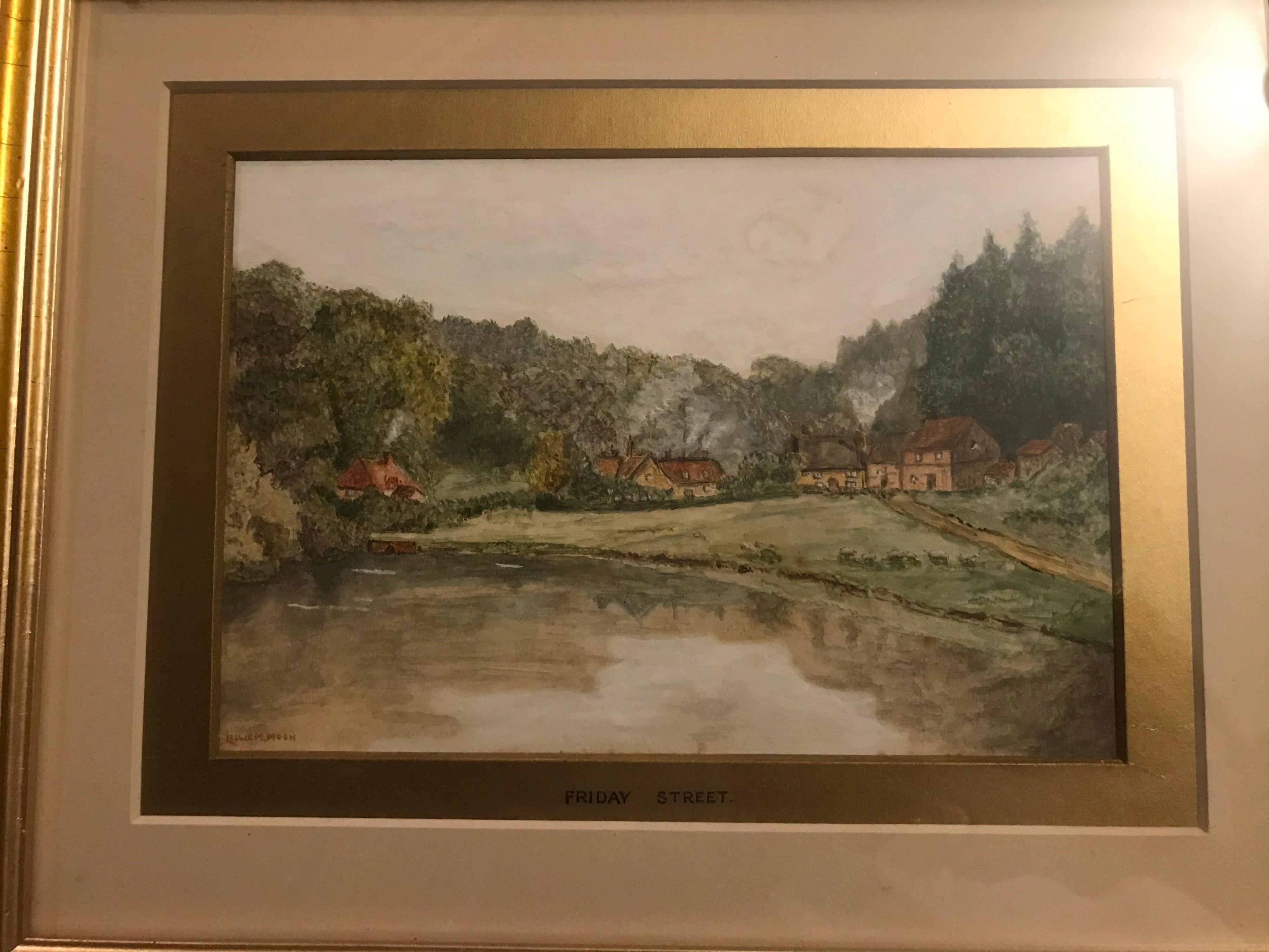 A charming watercolor painting by Leslie Moon. The diminutive painting in a later frame with double matting of a village scene. Measures: 11.5 inches wide, 9.25 inches high.
