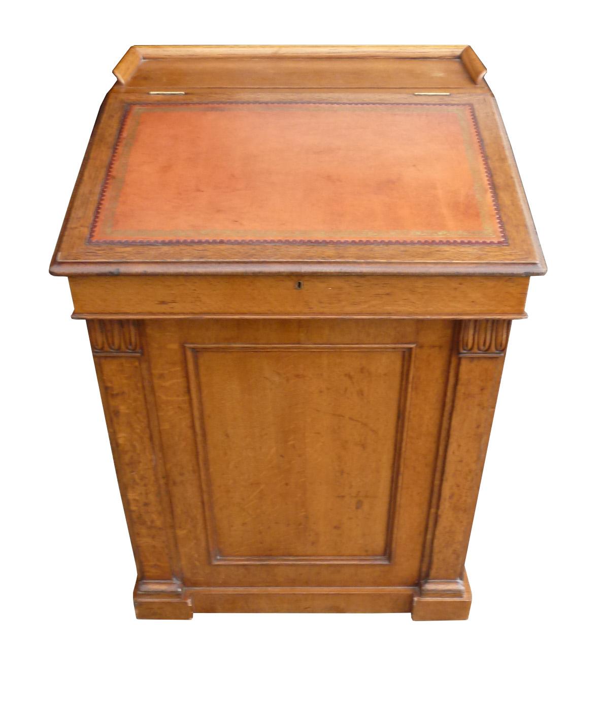 For sale is a good quality William IV oak sliding top davenport. The top of the davenport has a lid that lifts to reveal a fitted interior including ample storage space for stationary etc. It also has a rising fall which reveals further storage