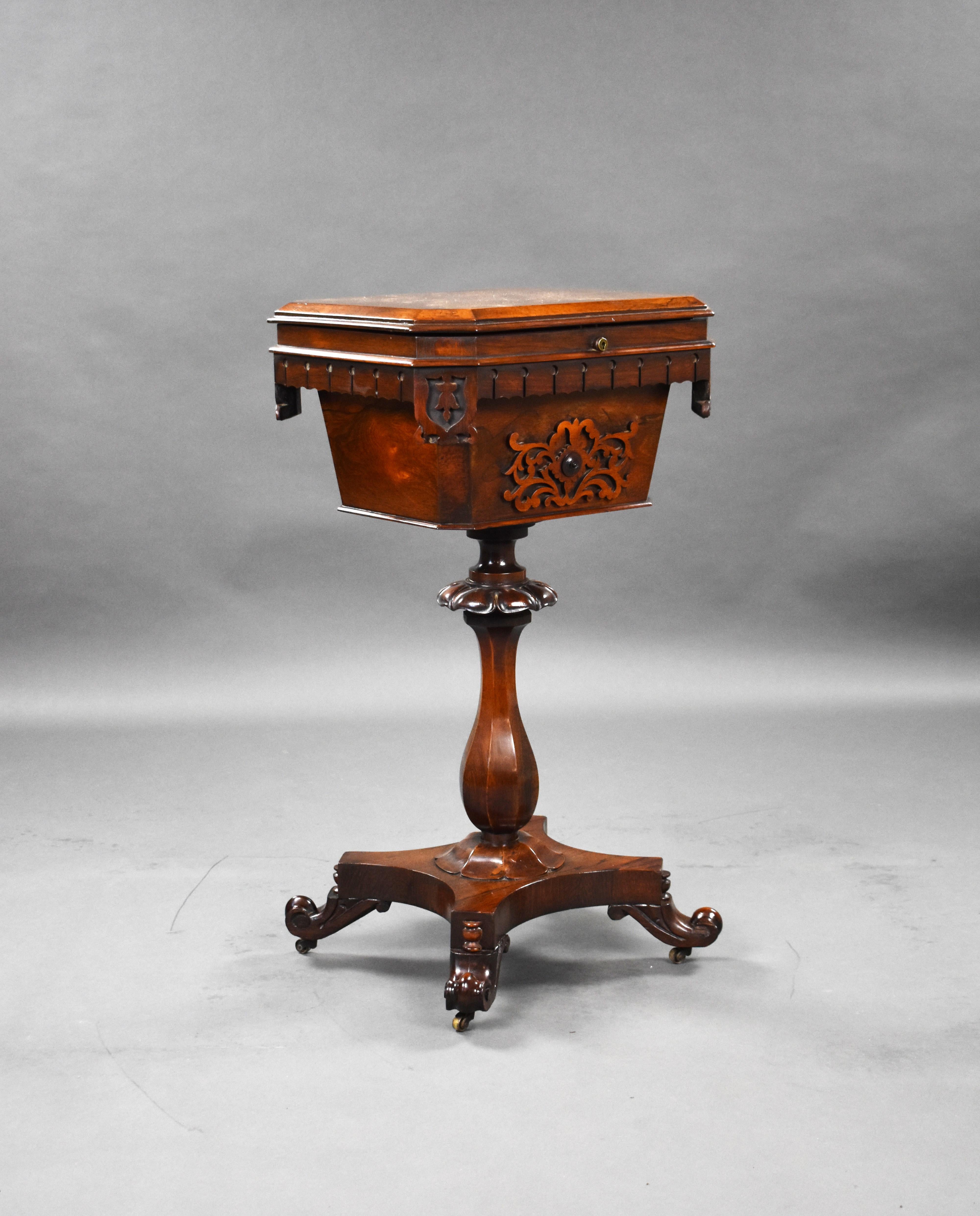 For sale is a good quality William IV rosewood tea poy, opening to a fitted interior retain its original glass bowls, above a turned stem over a platform base, standing on elegant feet raised on original castors. The tea poy remains in very good