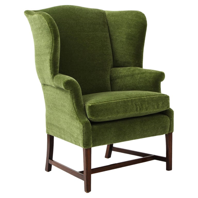 English wing chair in green mohair, 19th century, offered by FERRER