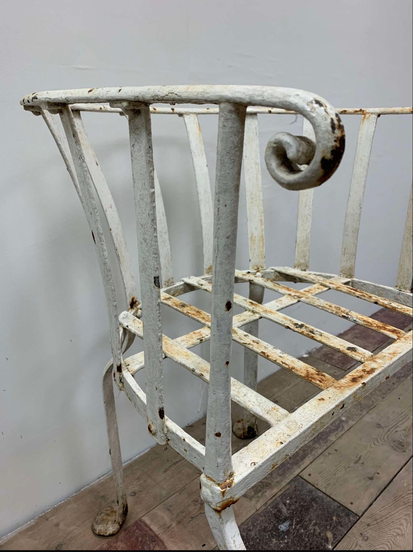 This lovely model, English circa 1830s.
Simple lines give this a smart understated look that could easily work for an interior with an upholstered squab cushion.
Repainted at some point it has, rounded back with scroll end arms and squashed pad