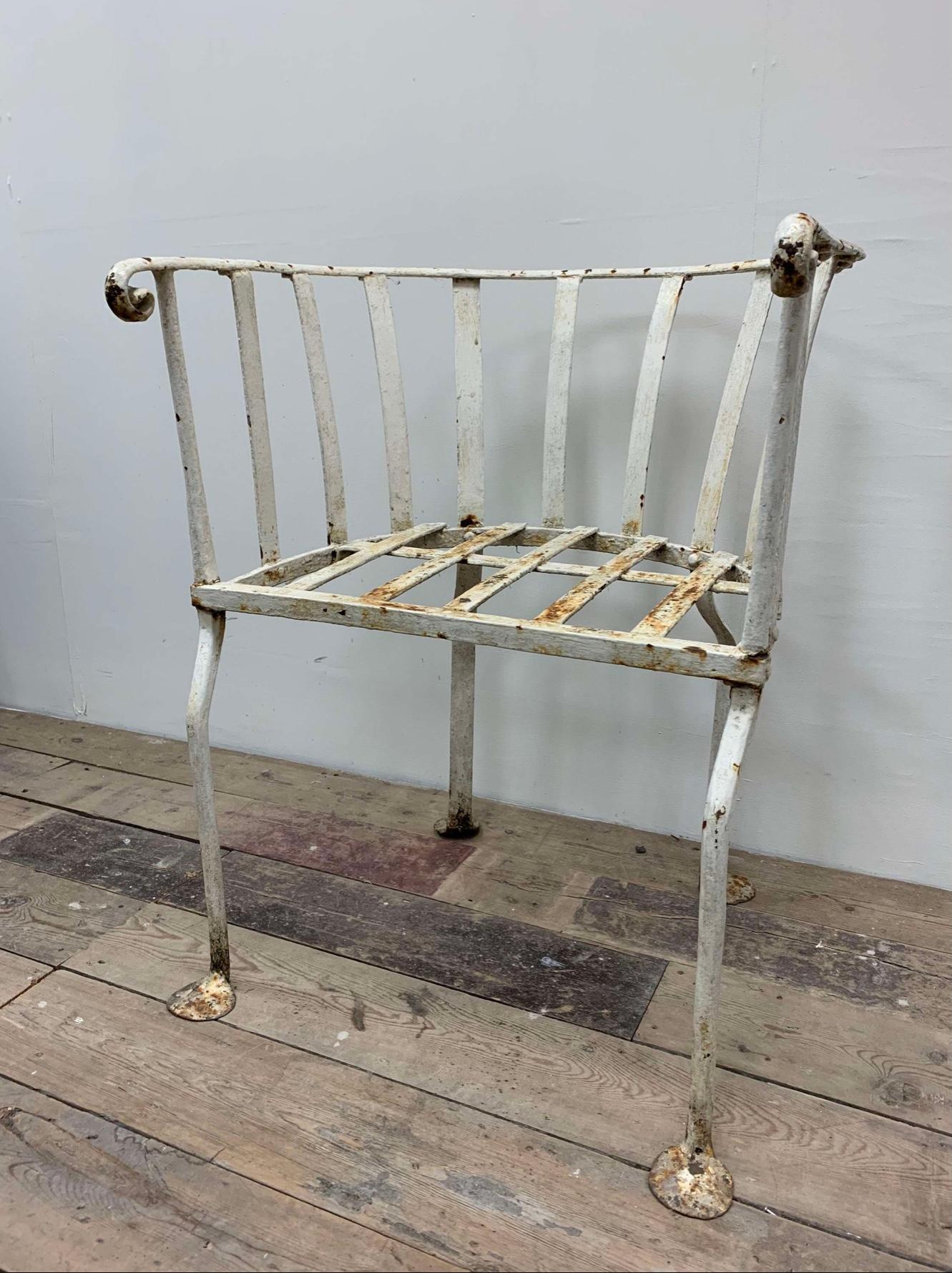 British 19th century English wrought iron garden chair with curved back For Sale