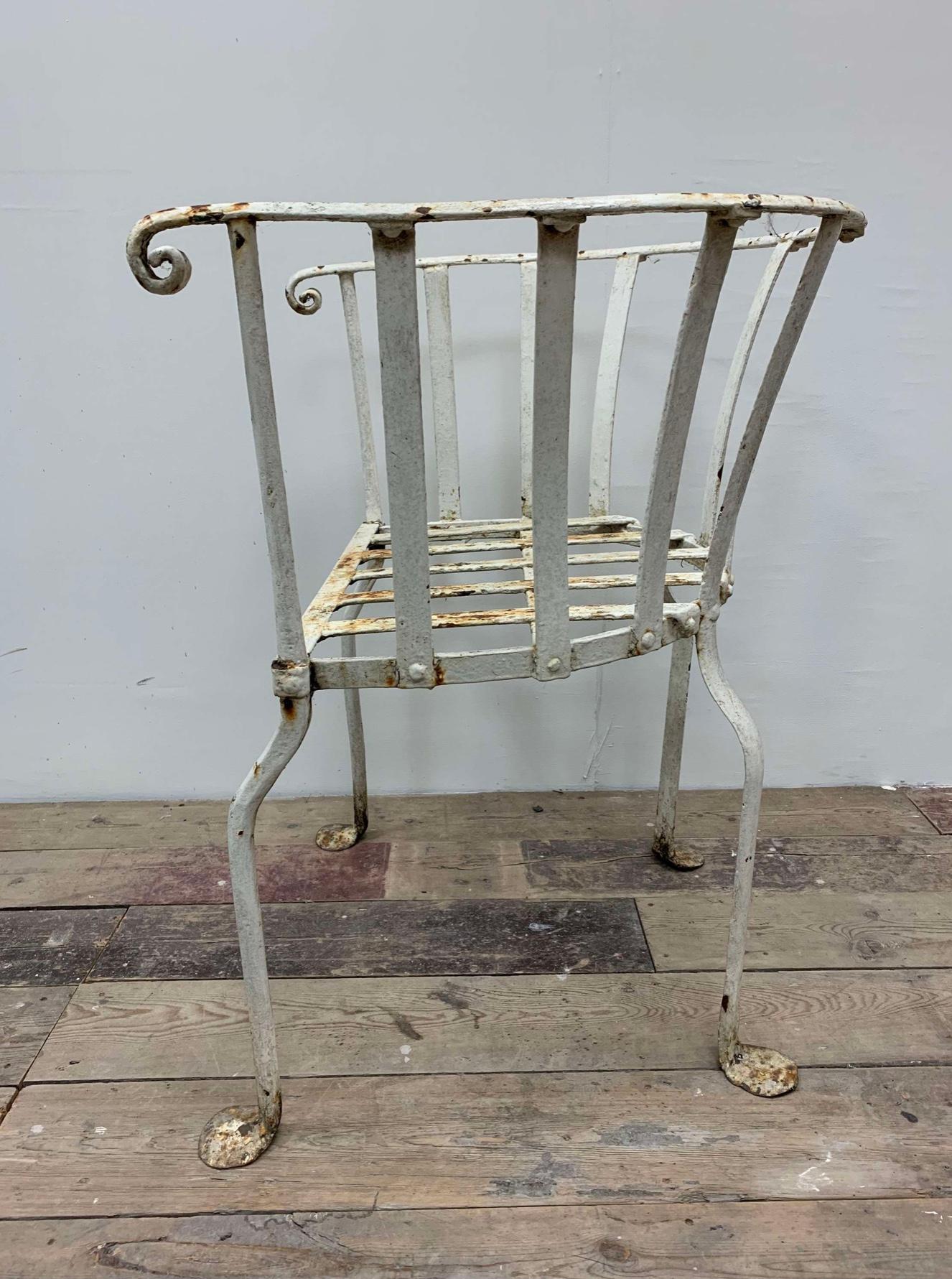 Wrought Iron 19th century English wrought iron garden chair with curved back For Sale