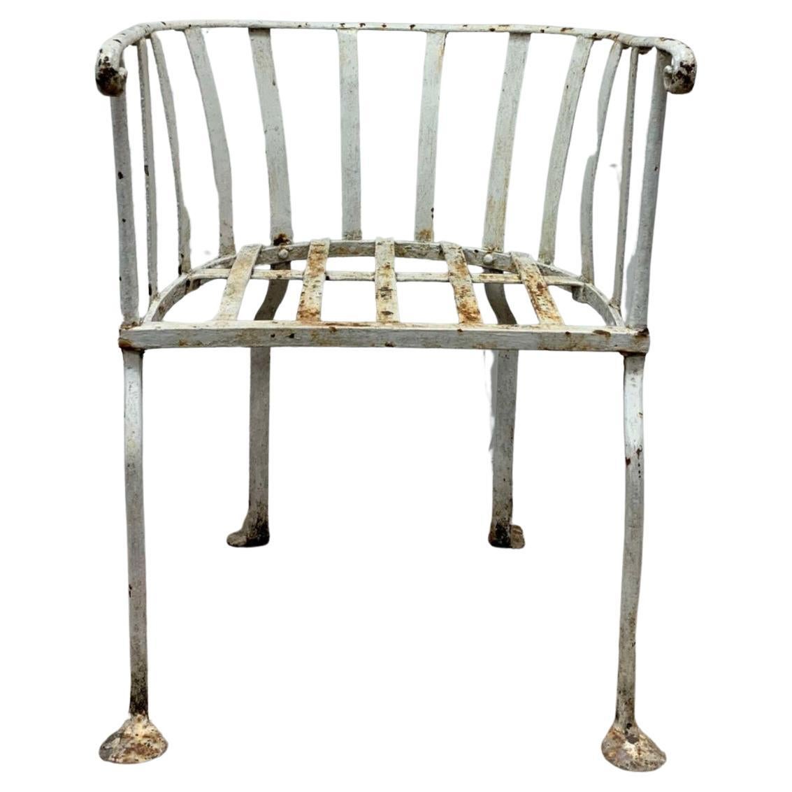 19th century English wrought iron garden chair with curved back For Sale