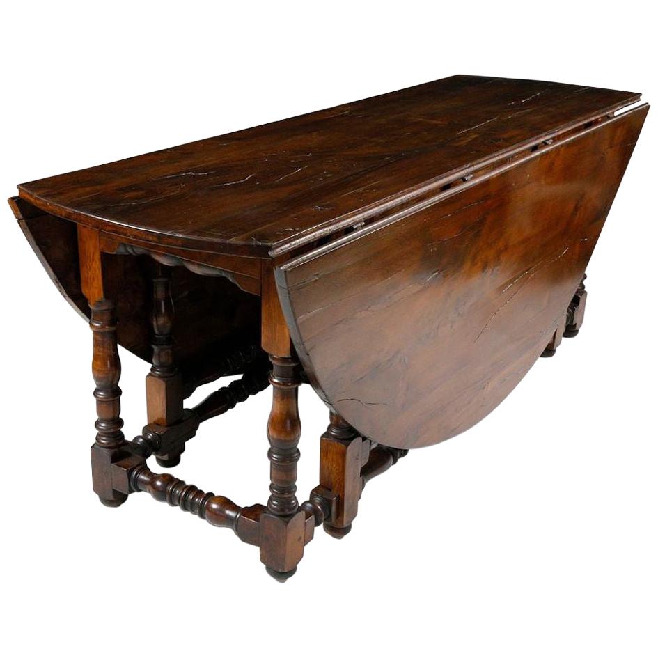 19th Century English Yew Wood Drop-Leaf Gate Leg Dining Table