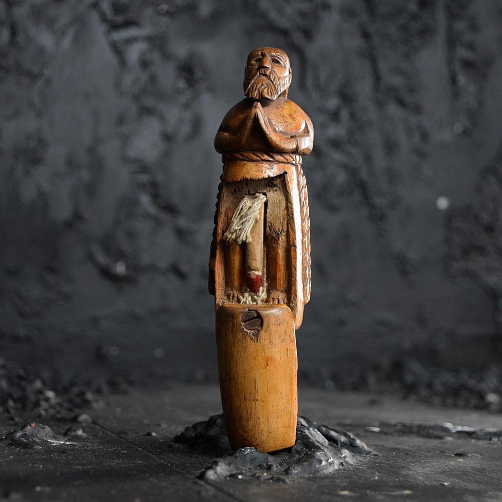 19th century erotic snuff box

We are proud to offer a rare example of a mid-19th century erotic snuff box, in the form of a praying bishop. A finely carved example with two hidden compartments, one for storing snuff and the other reveals a
