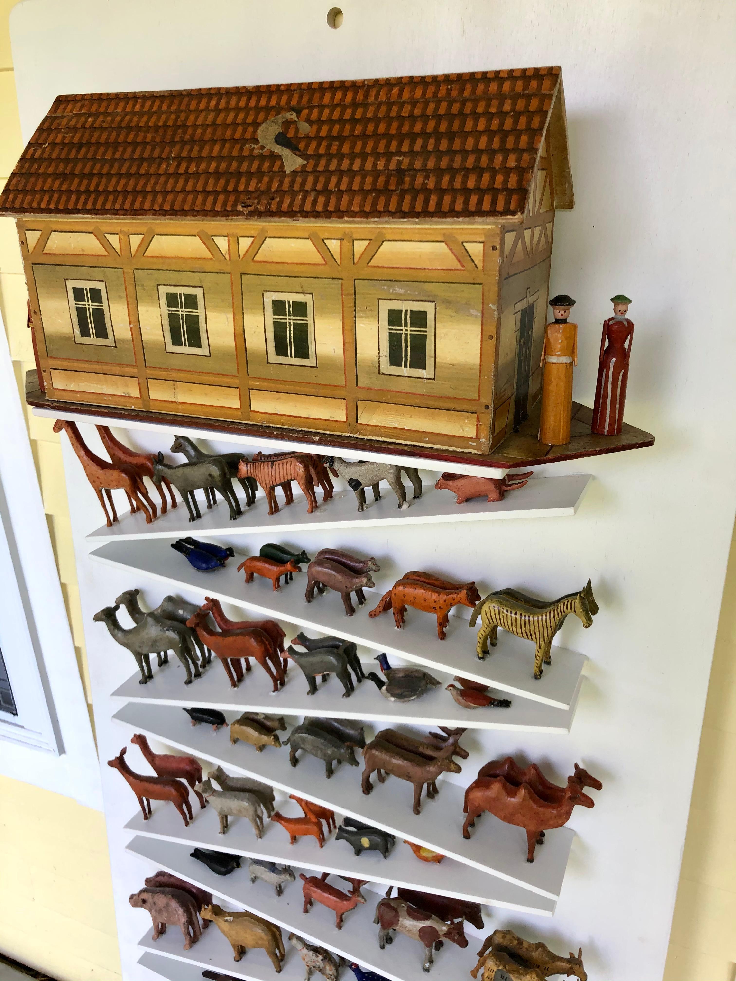 These ark collections were a very popular toy in the 19th century from Erzgebirge in Germany. This particular set is quite substantial with over 120 carved and painted figures and it presented on a custom wall mount display. Sets of this size and