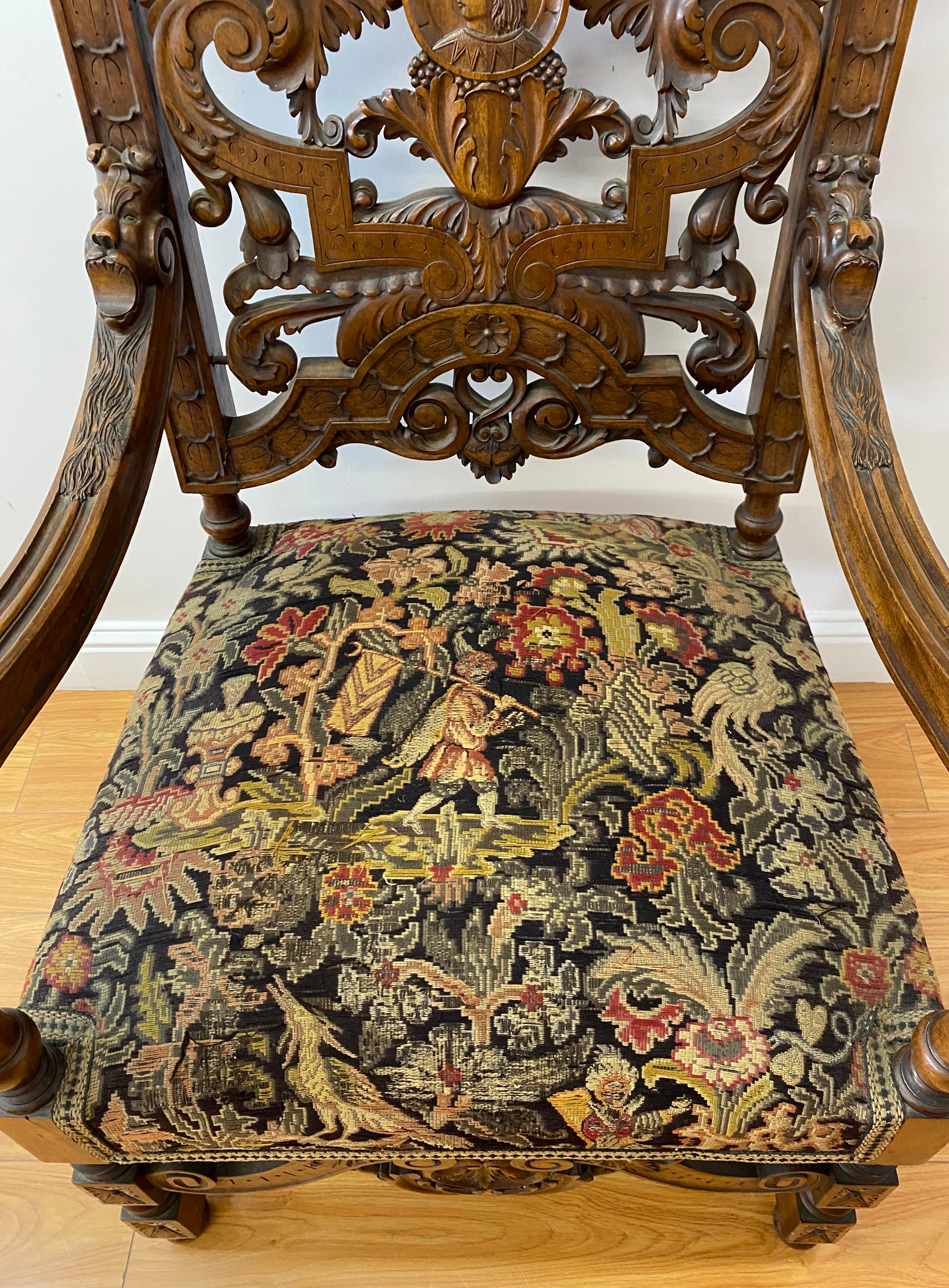 English 19th Century European Carved Walnut Arm Chair with Tapestry Upholstery