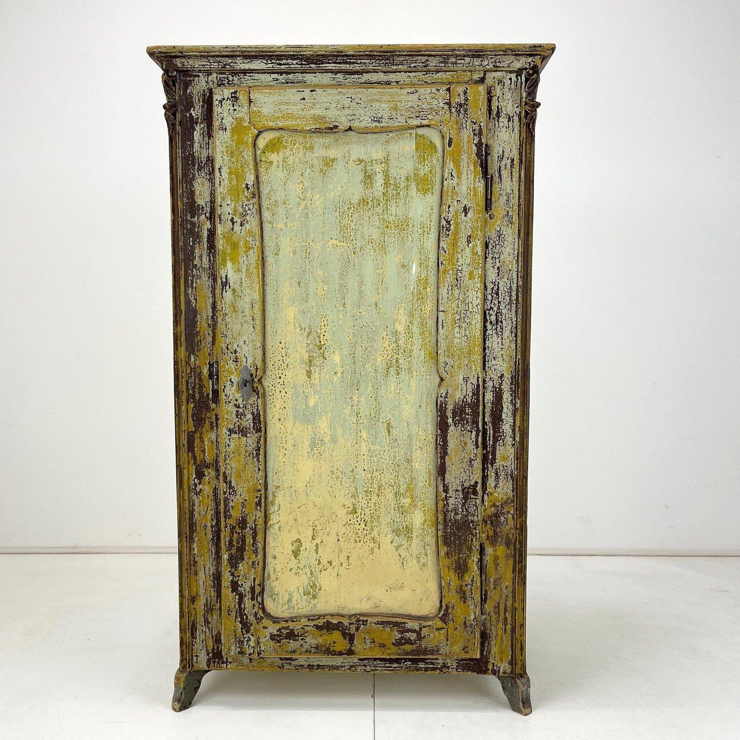 Beautiful antique food cabinet with an original paint which gives the cabinet a stunning patina. 
Original condition, slightly sanded, cleaned and waxed. 
New lock.