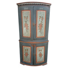 19th Century European Paint Decorated Two Part Bow Front Corner Cupboard