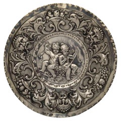 19th Century European Repoussé Silver Dish with Children Grotesque Mask FIgures