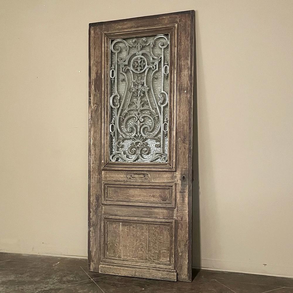 French 19th Century Exterior Door with Cast Iron Insert