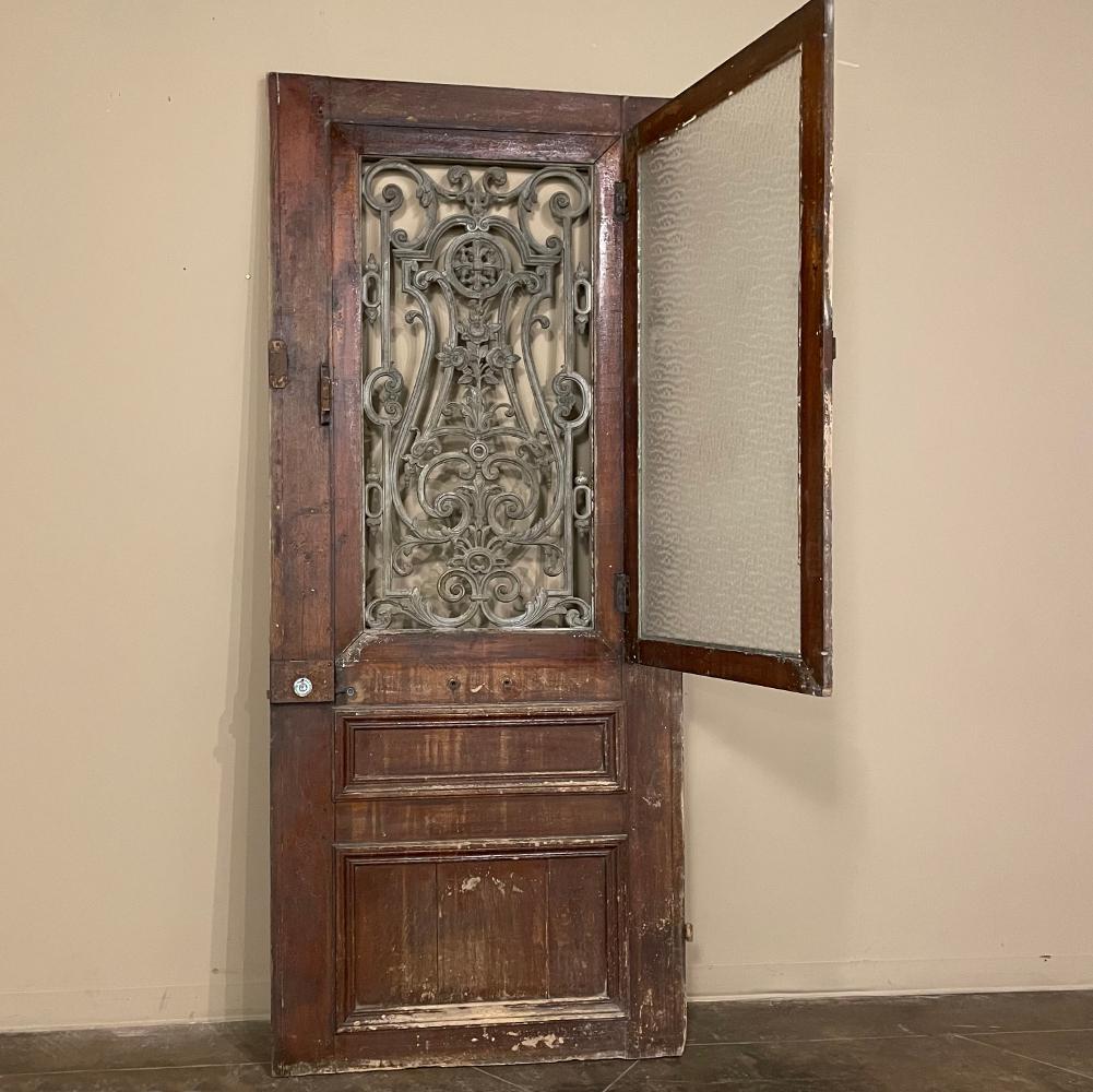 Late 19th Century 19th Century Exterior Door with Cast Iron Insert