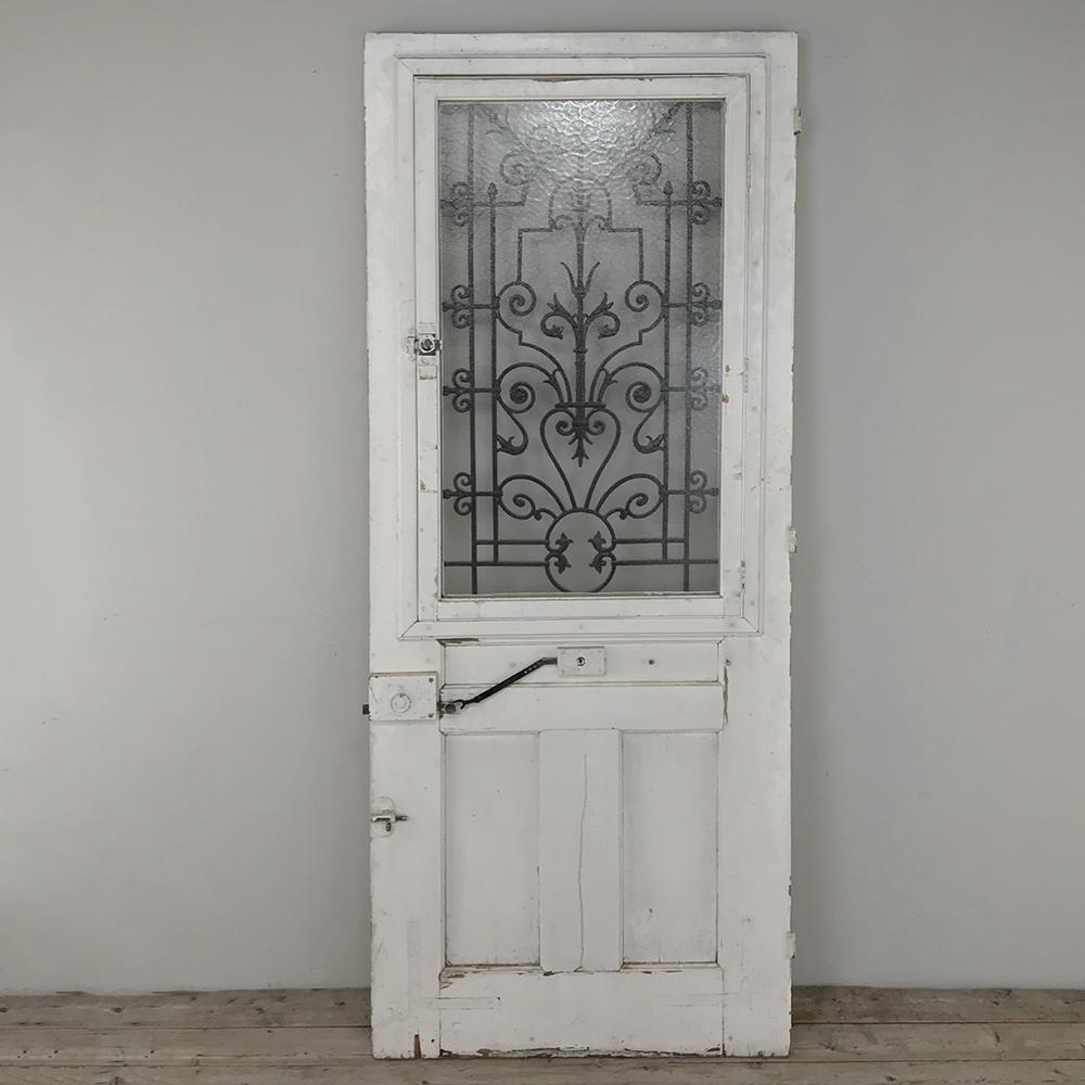 French 19th Century Exterior Door with Wrought Iron