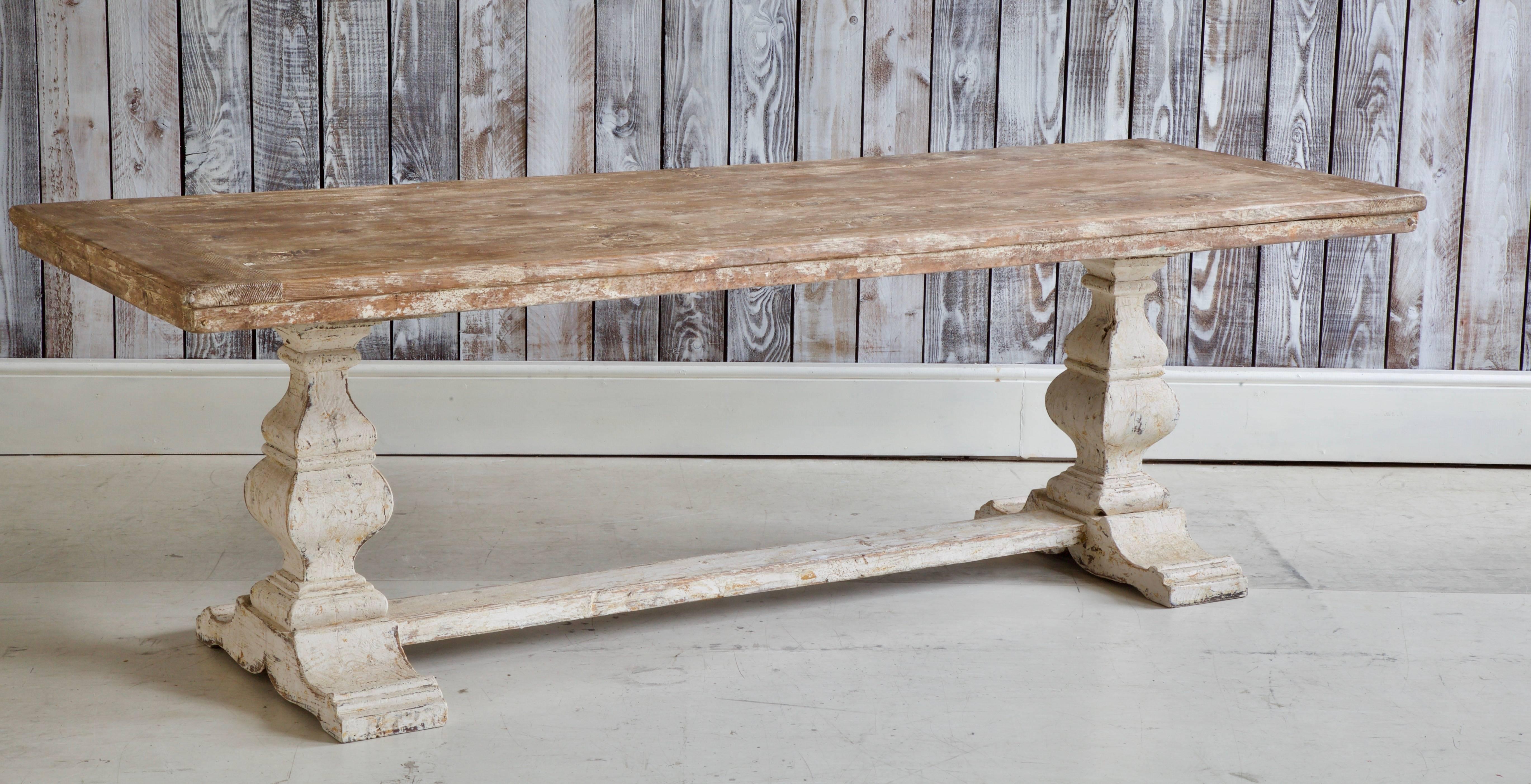 19th century farmhouse trestle table from Tuscany, Italy. Painted with an organic and original patina, wonderfully textured finish in white gesso.