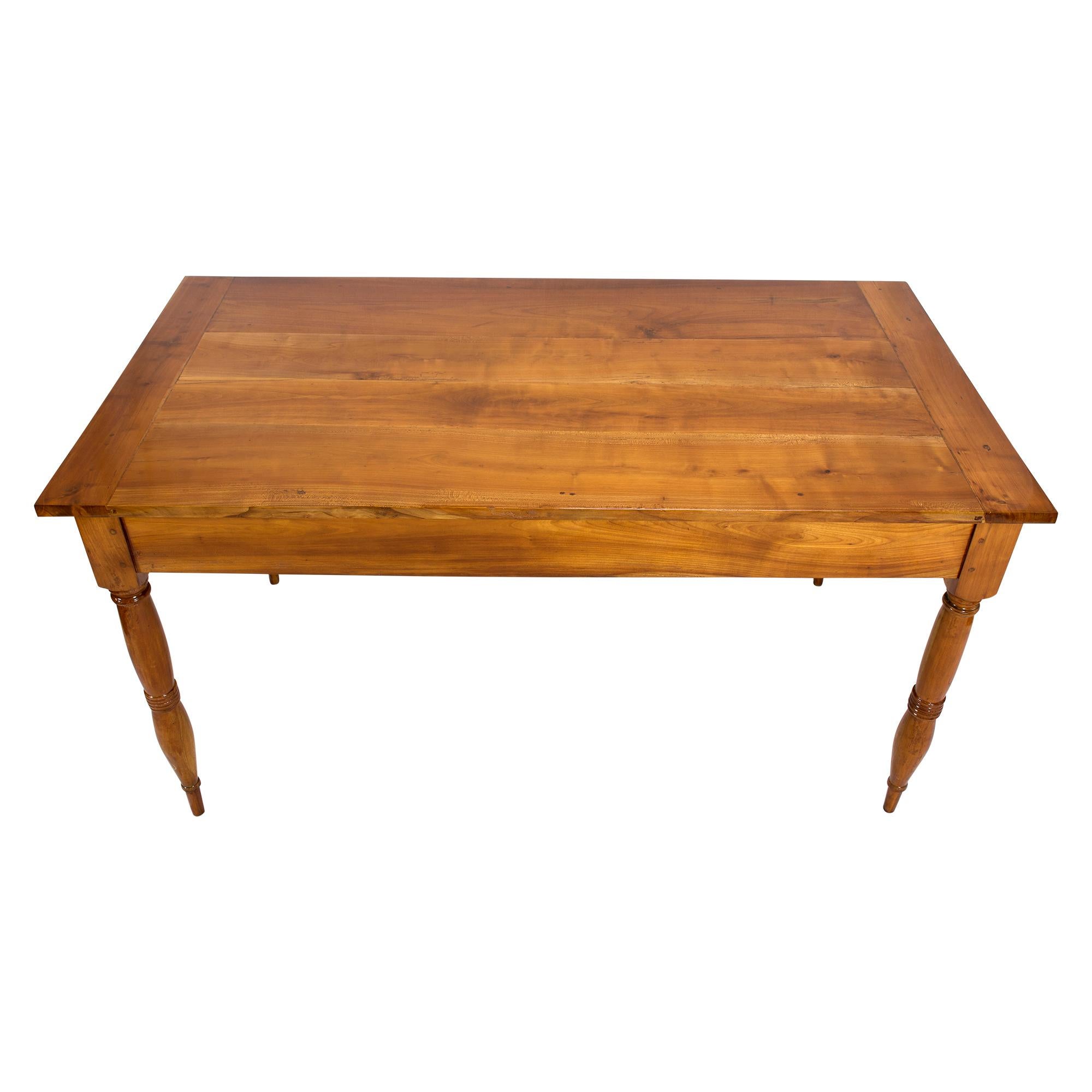 Farmer's table made of solid cherrywood from the late Biedermeier period, circa 1850 from southern Germany. The table has two drawers, one on each short side.
The distance from the floor to the frame is 61.5 cm.
The table is in a very well